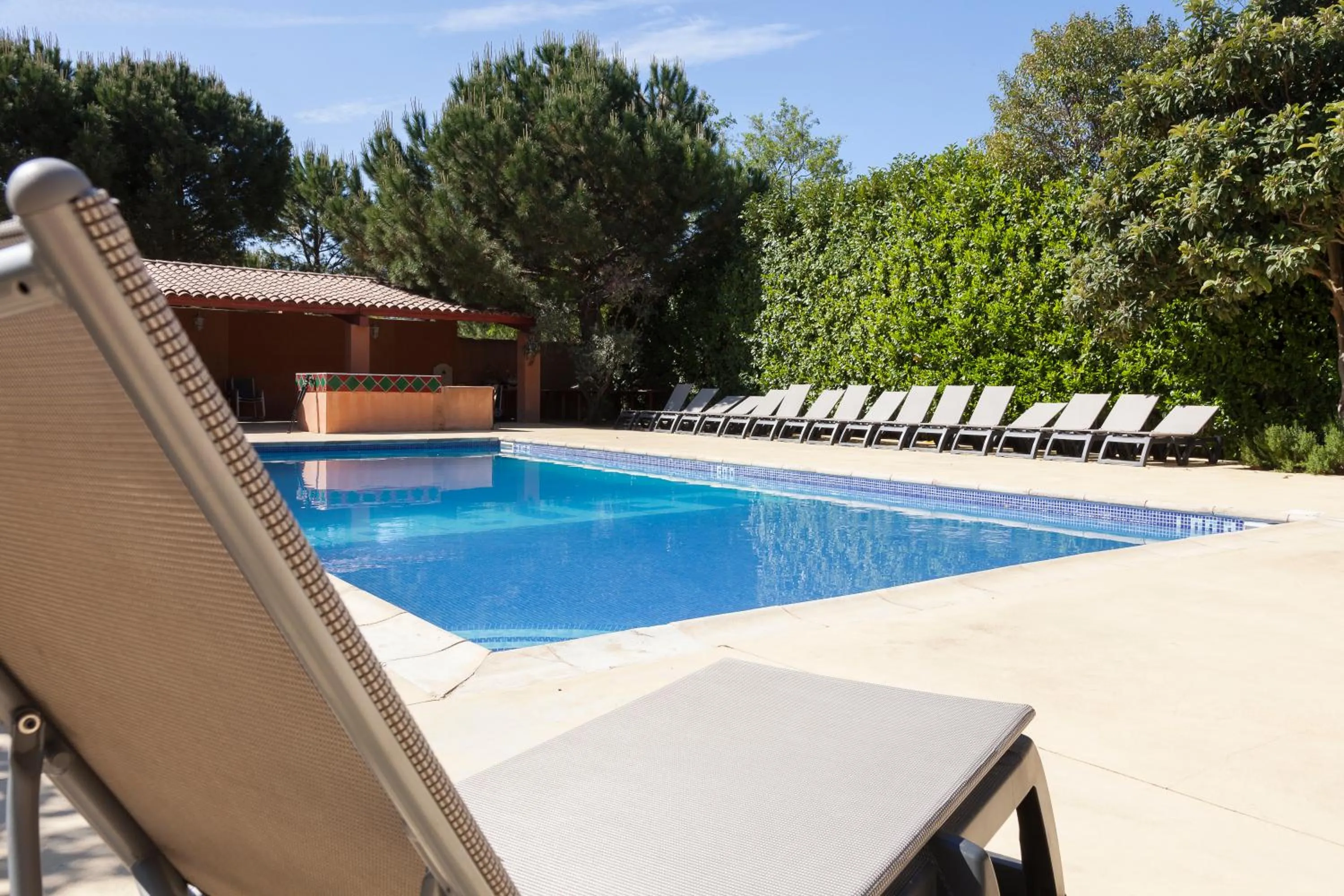Swimming pool in LOGIS HOTEL & RESTAURANT L'ETAPE Bouc Bel Air - Gardanne