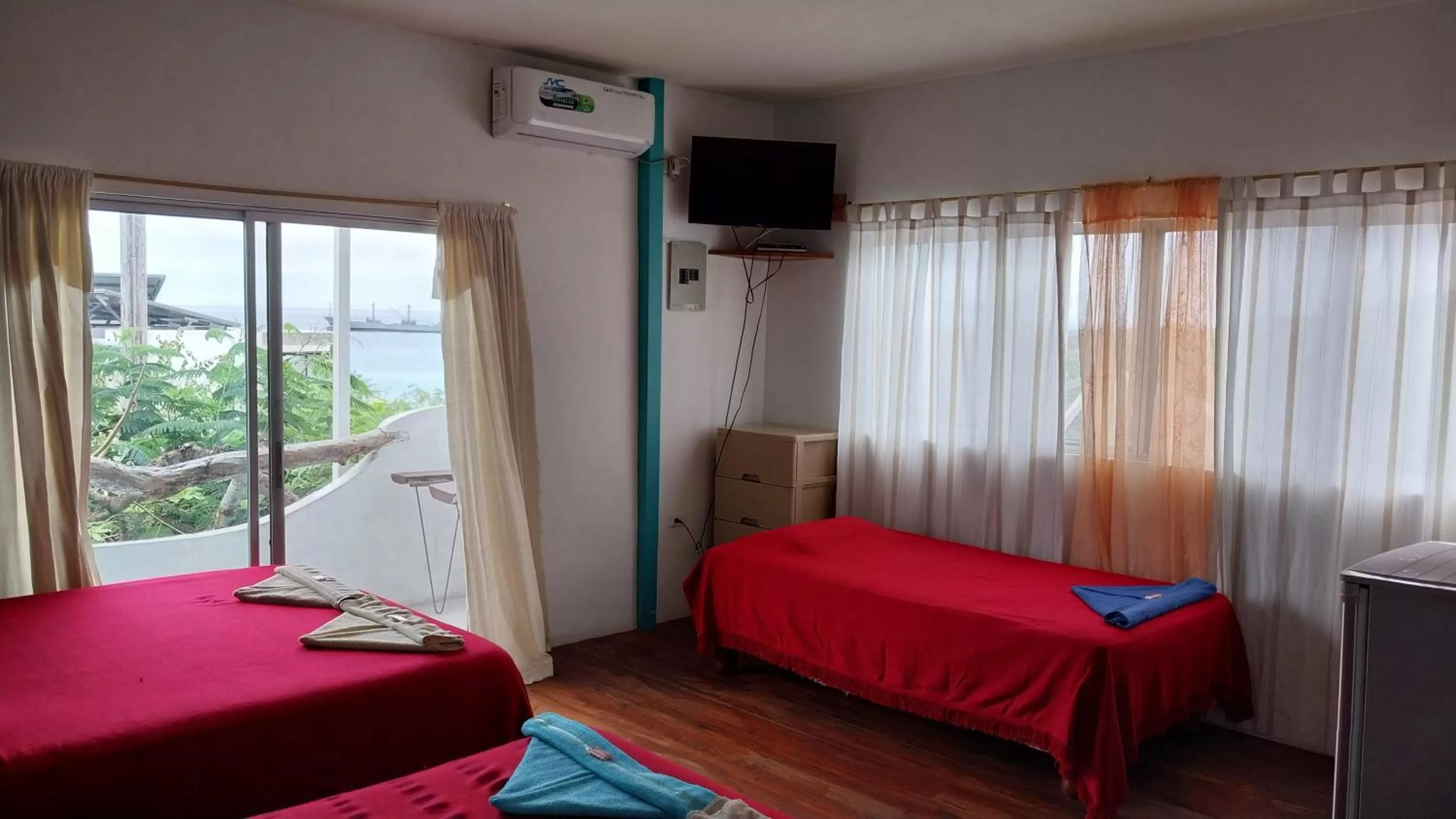 Bed in Hostal Cabañas Don Jorge