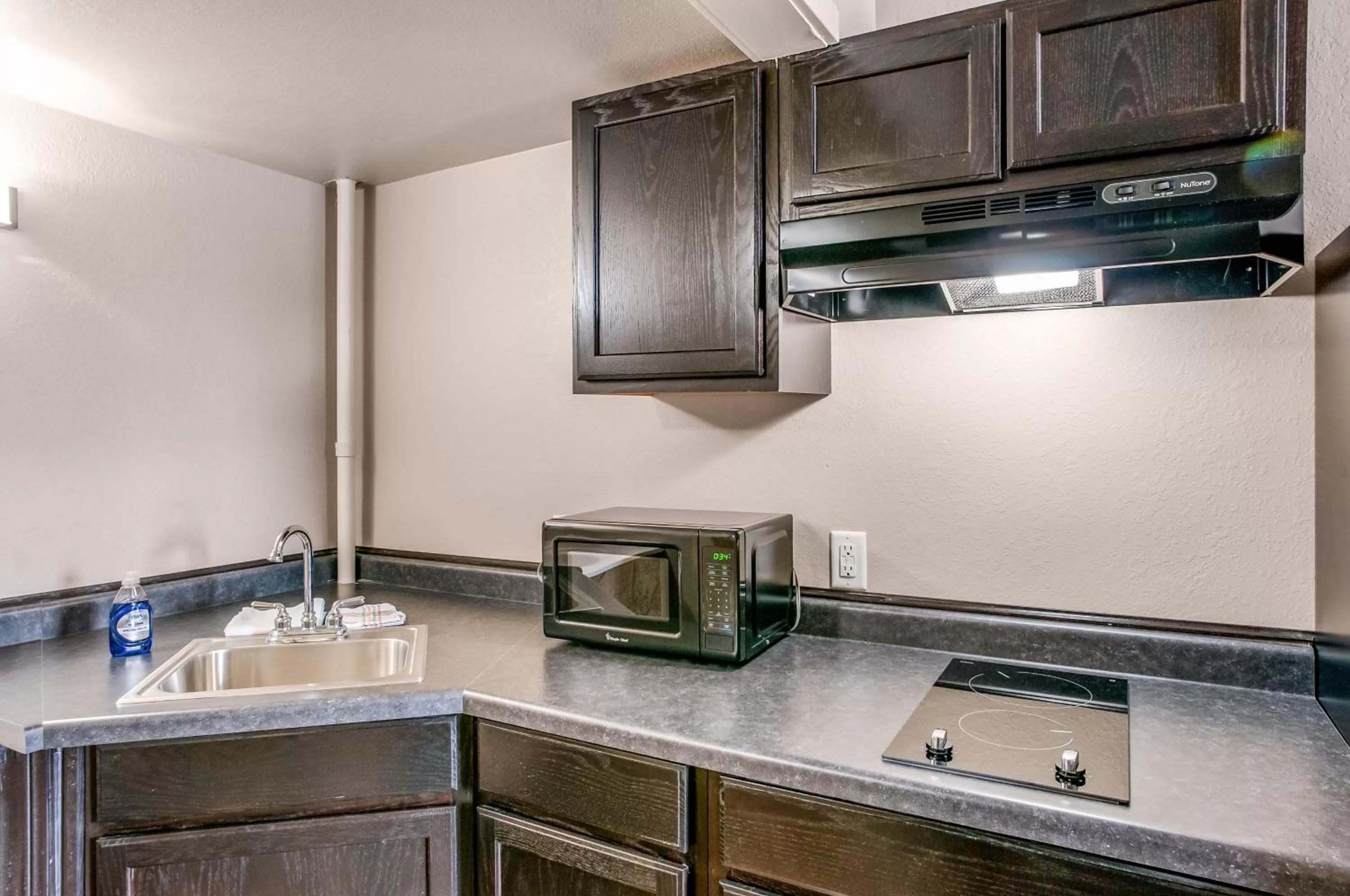 Kitchen or kitchenette in Suburban Studios Neenah-Appleton