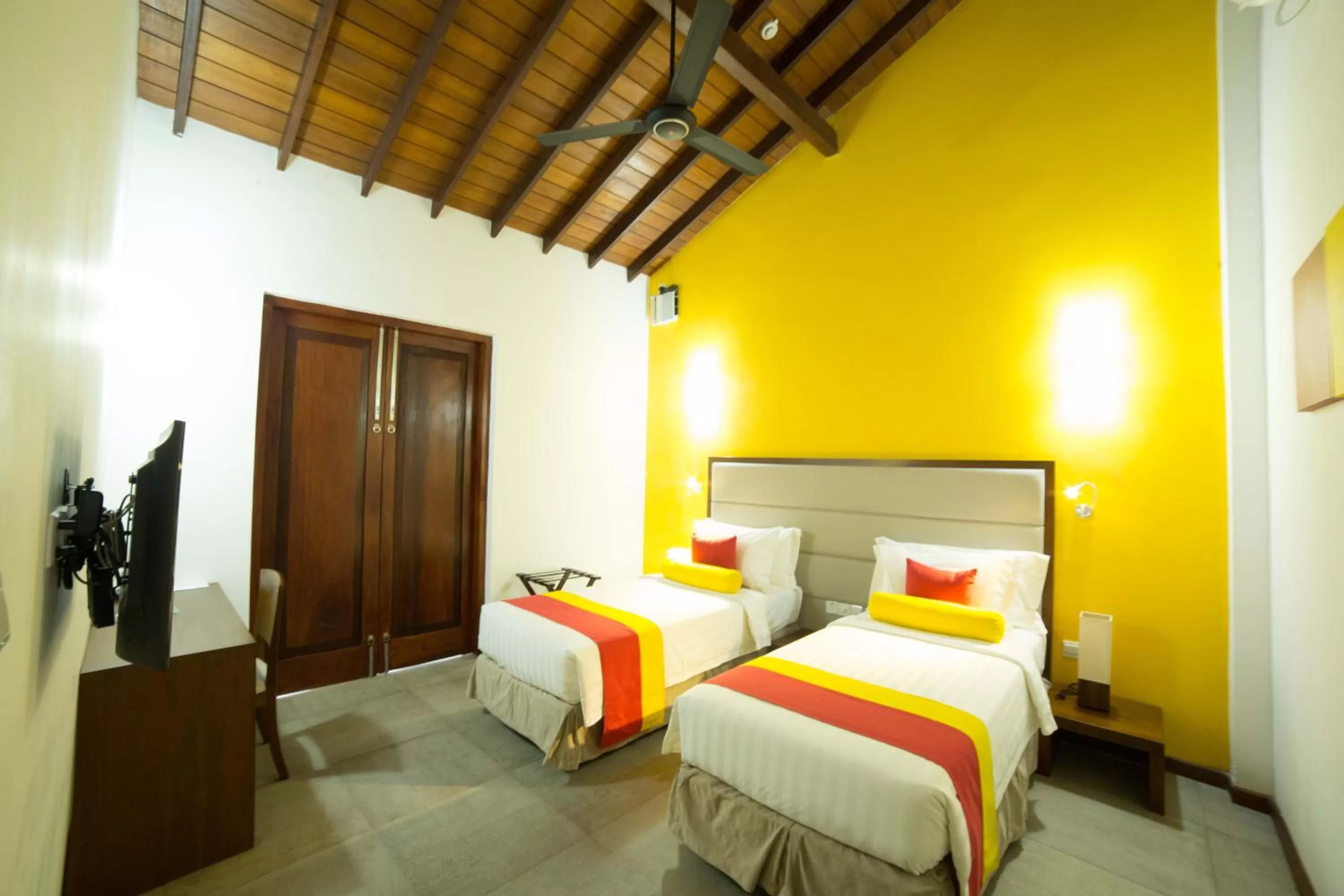 Bed in The Thinnai - All-Suites Boutique Hotel
