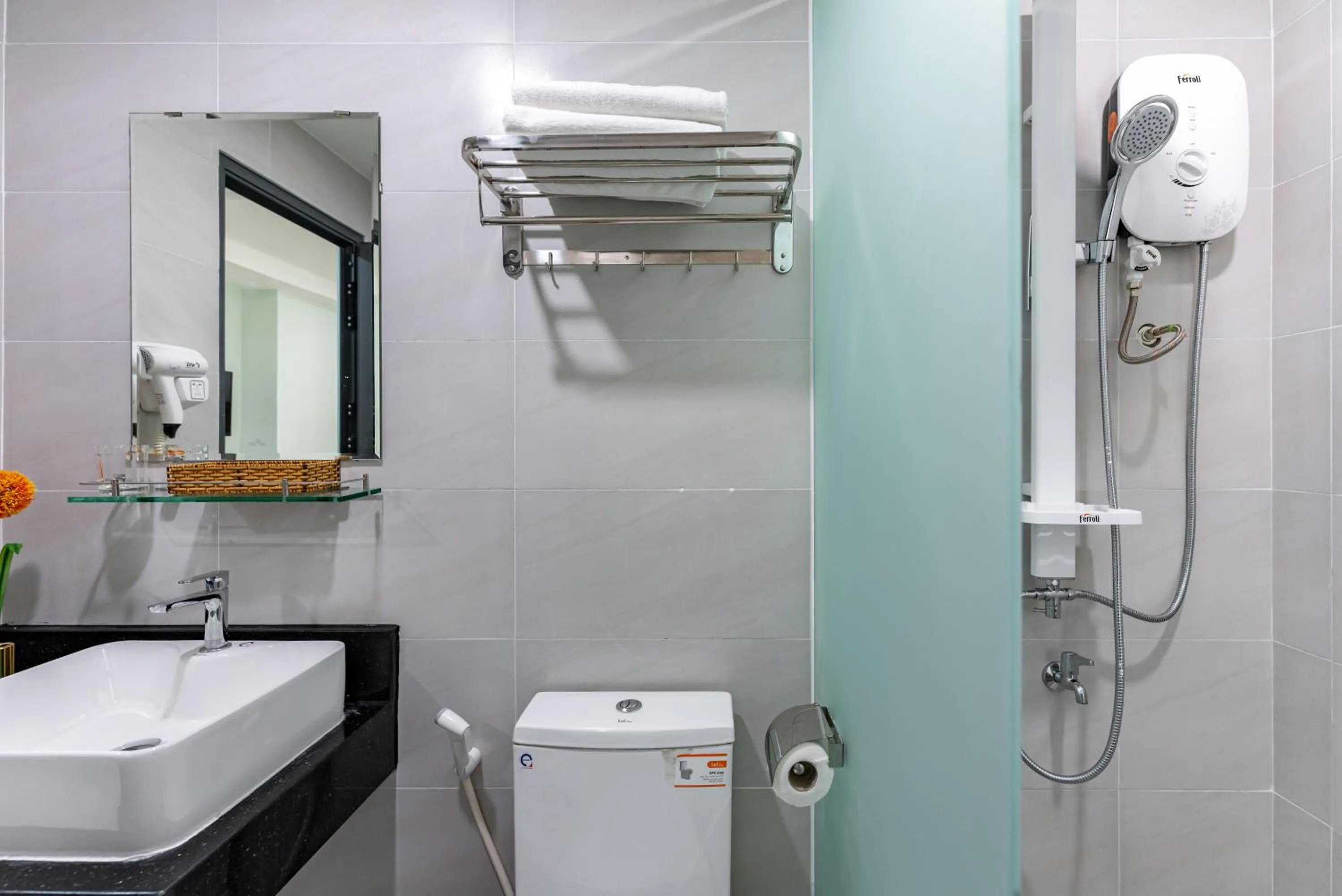 Shower in Cherry Hotel and Apartment