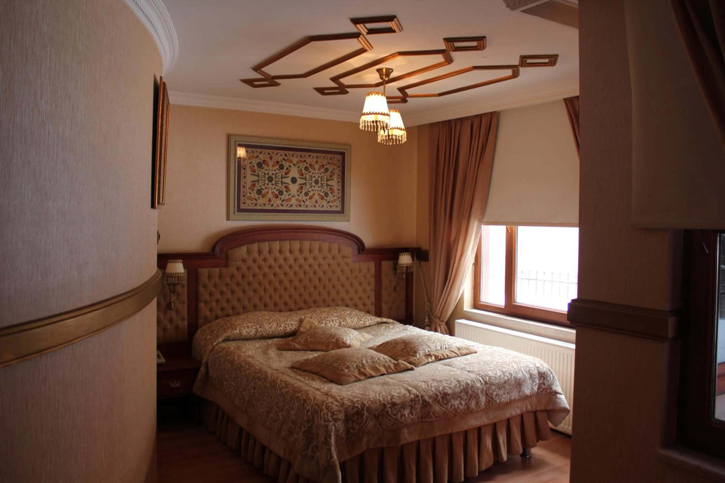 Bed in Aruna Boutique Hotel