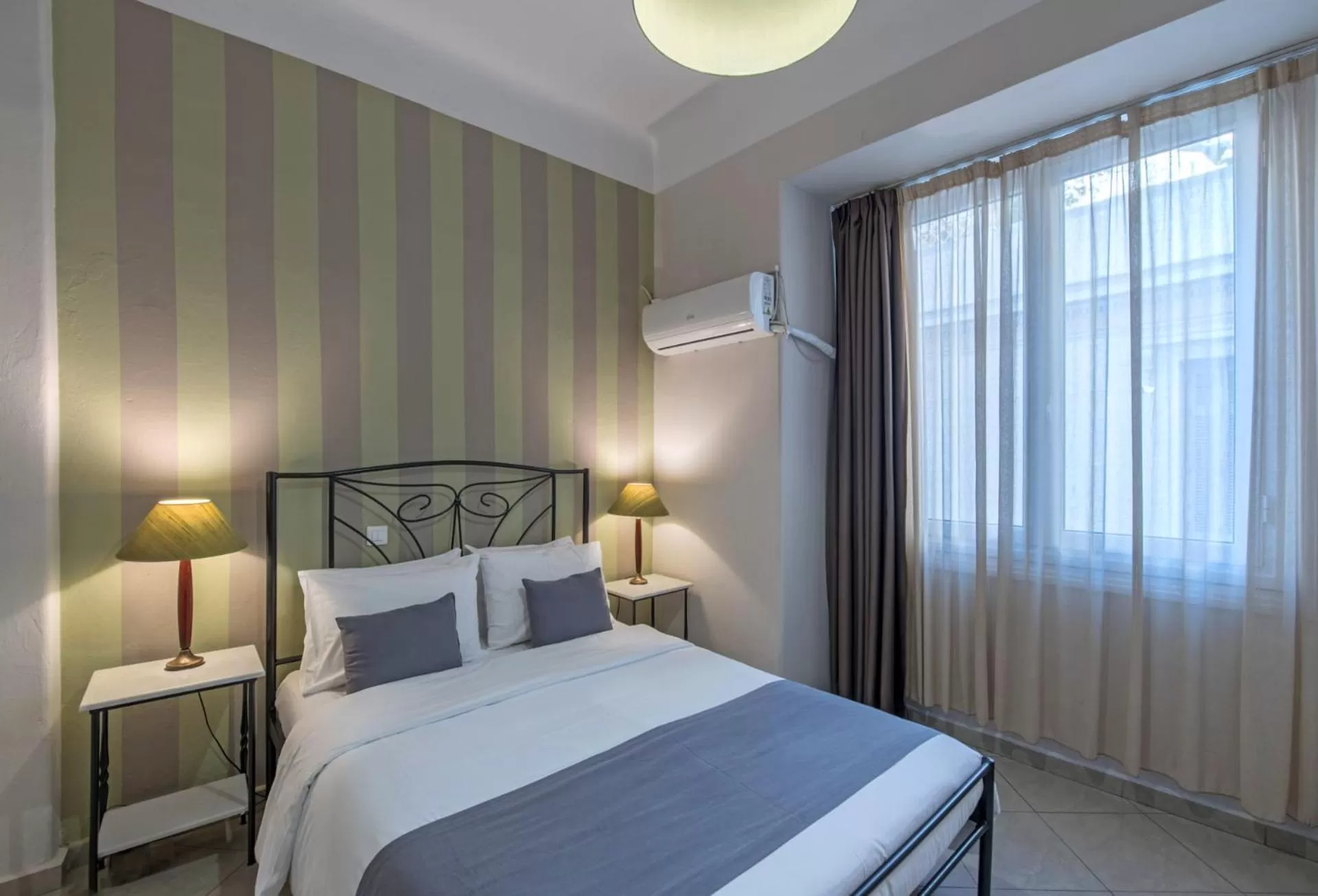 Bed in Kimon Hotel Athens