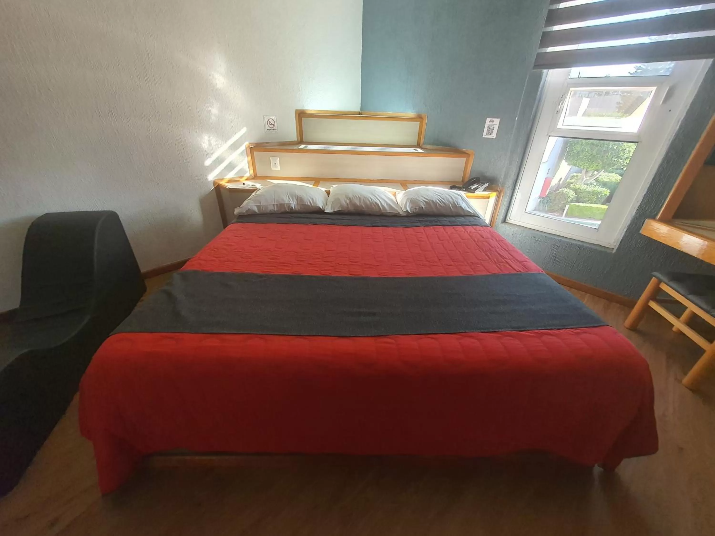 Bed in Hotel Alcampo