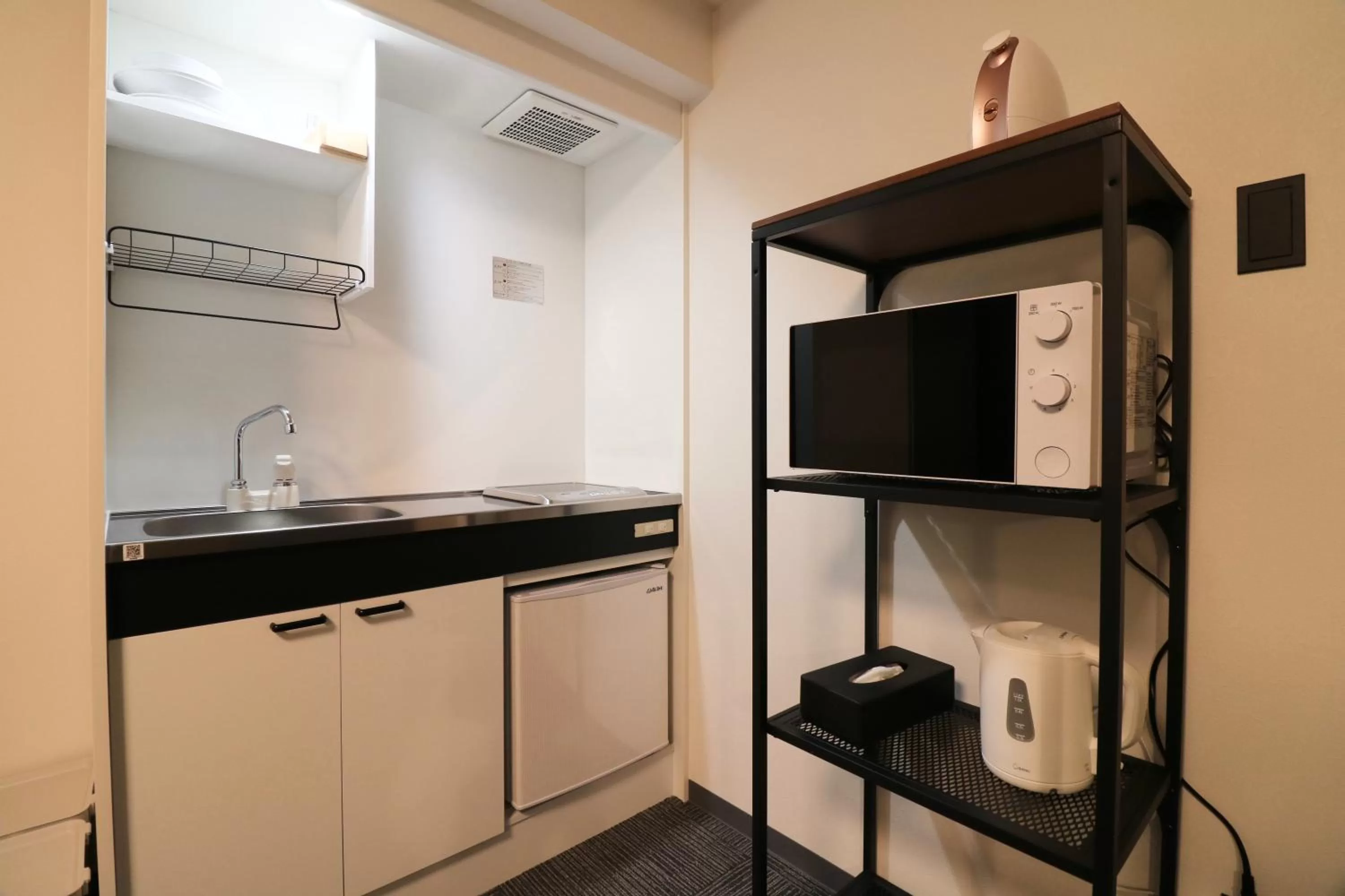 Kitchen or kitchenette in TAKETO STAY PREMIERE SAPPORO Eki