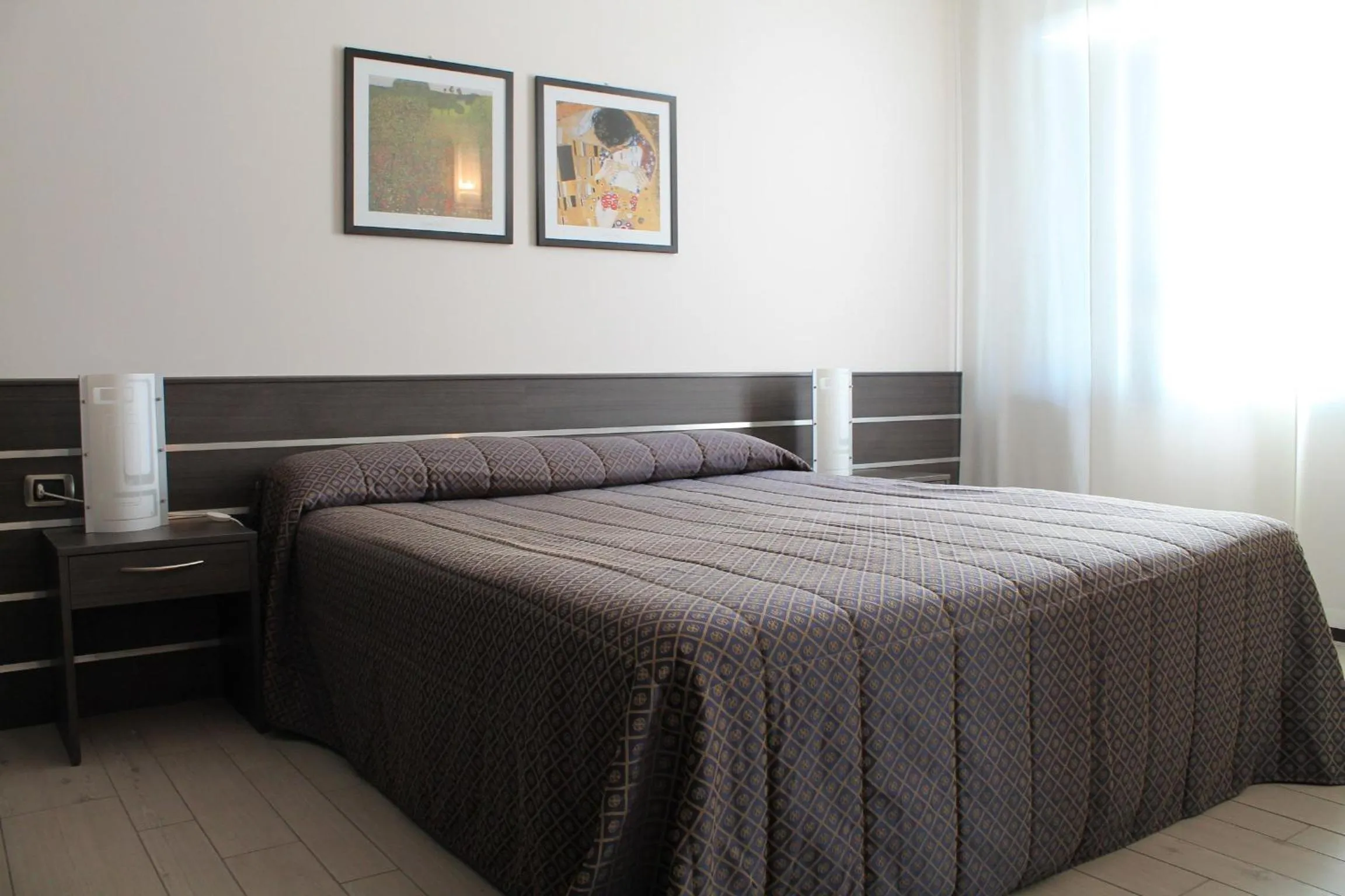 Bedroom in Hotel Residence Aurora