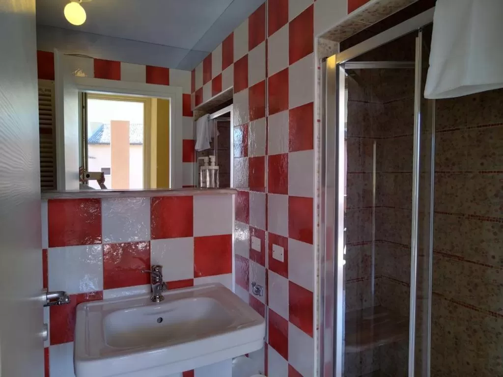 Bathroom in Borgo al Sole by Garda Facilities