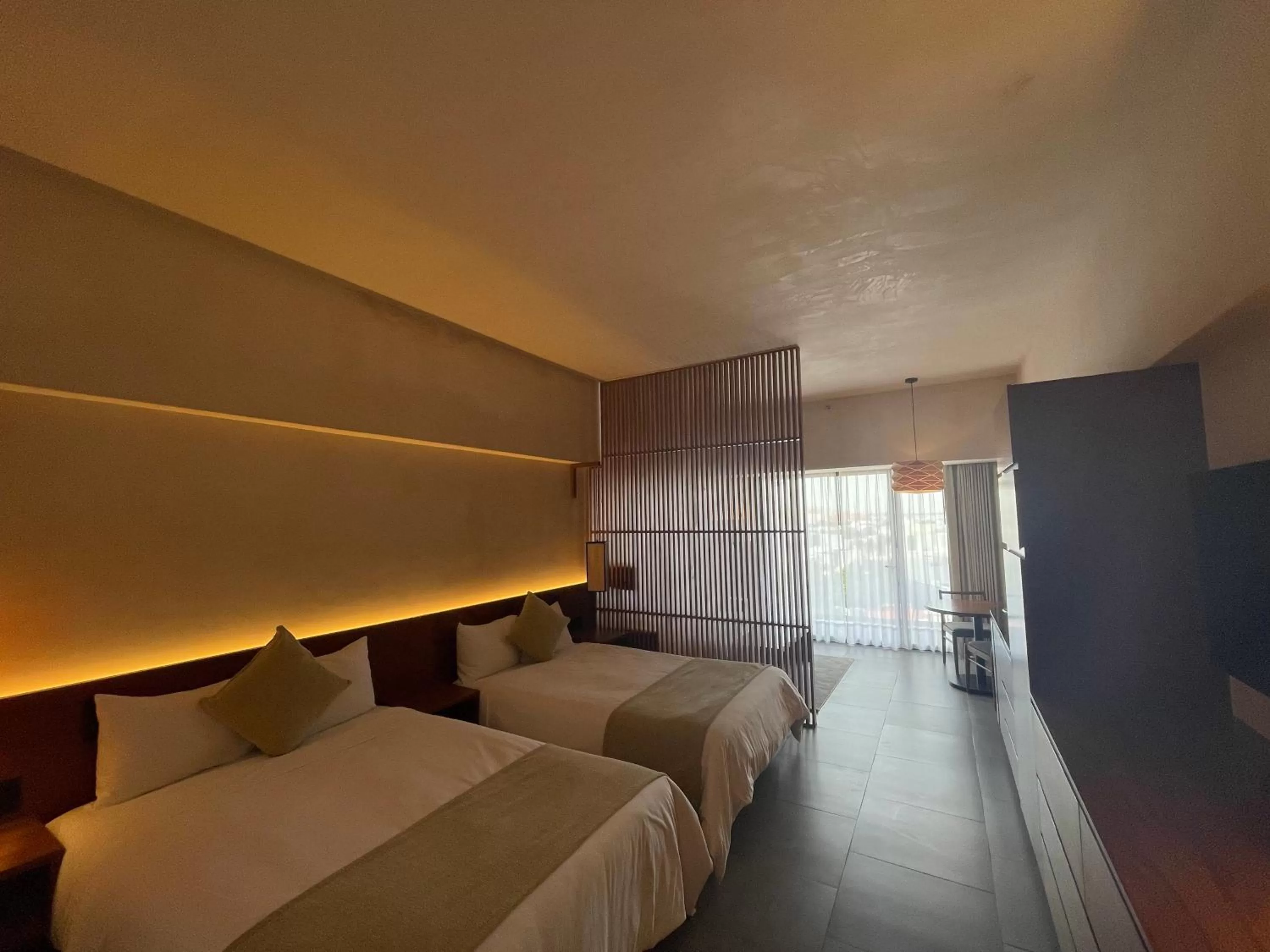 Bed in Hive Cancun by G Hotels