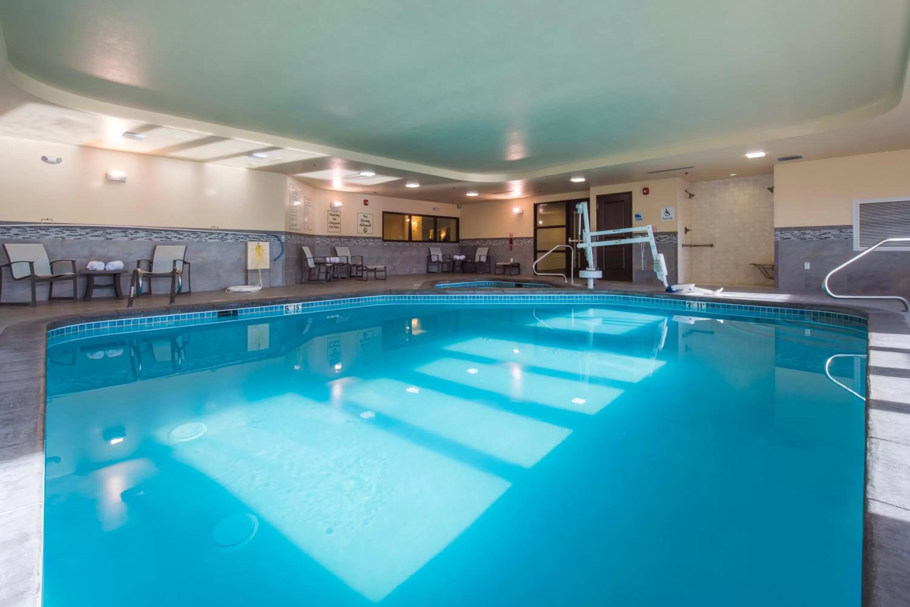 Swimming pool in Holiday Inn Express & Suites Colorado Springs Central by IHG