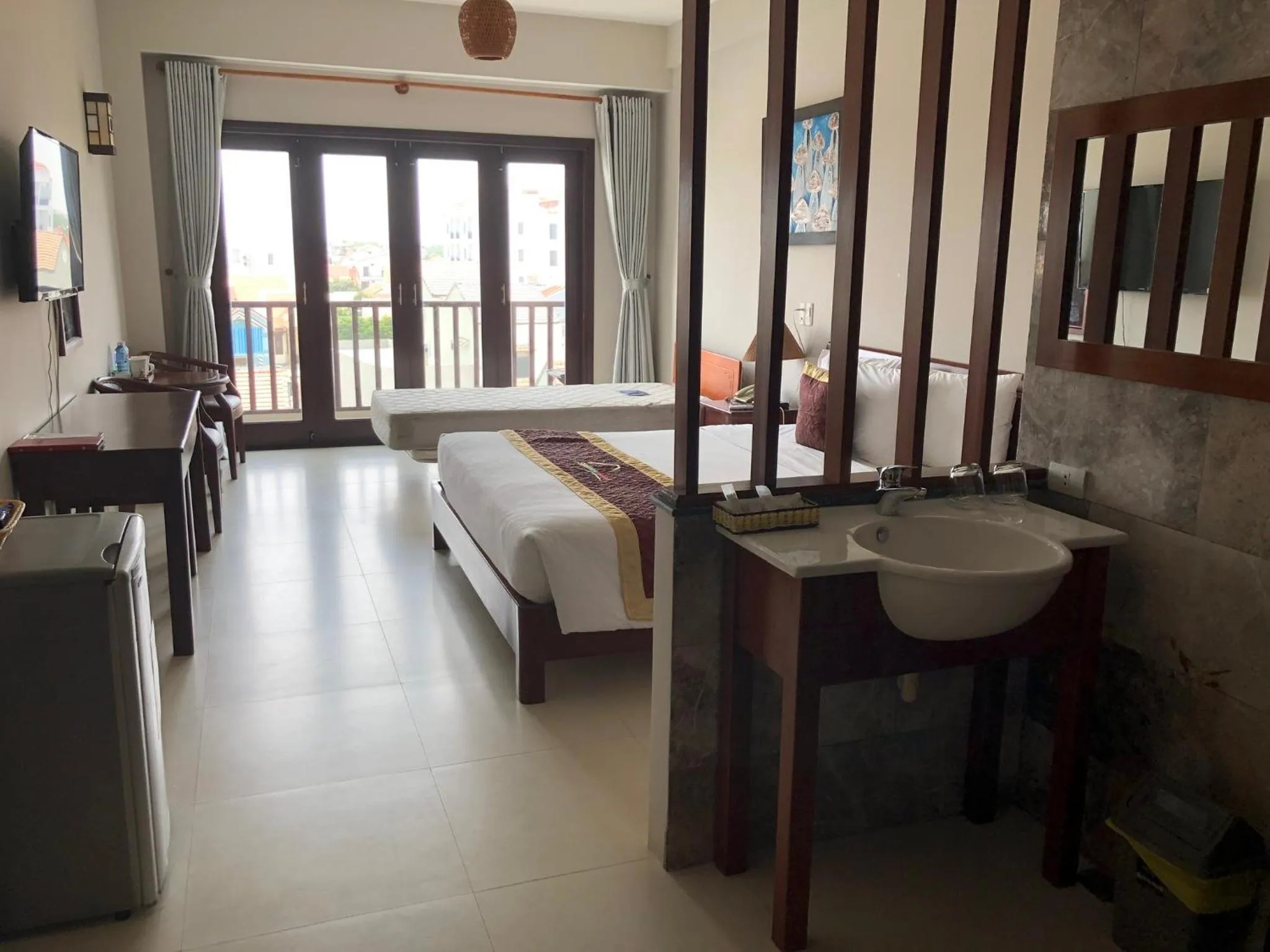 Bed in Sunshine Hoian Hotel