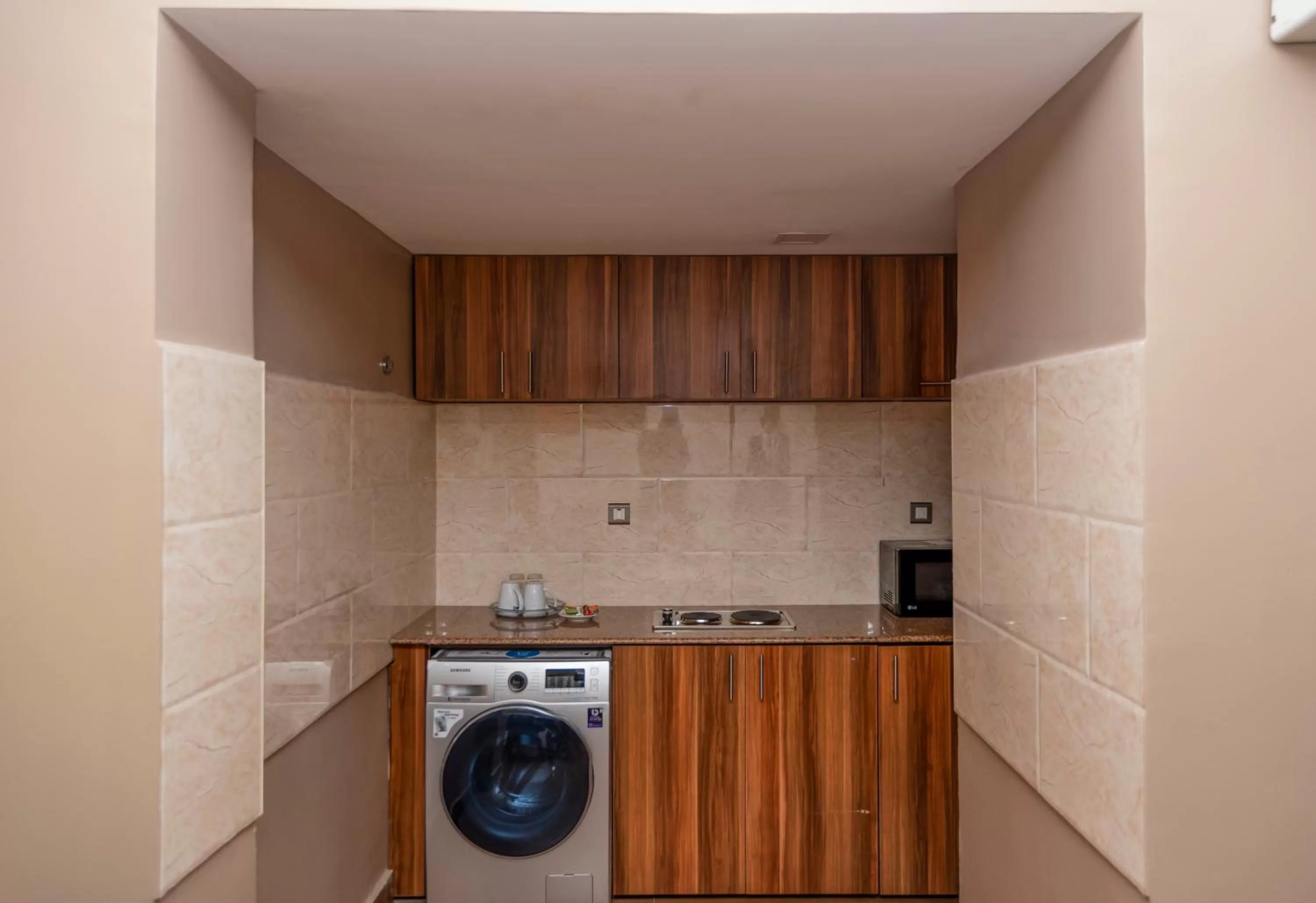 Kitchen or kitchenette in Hawthorn Suites by Wyndham Abuja