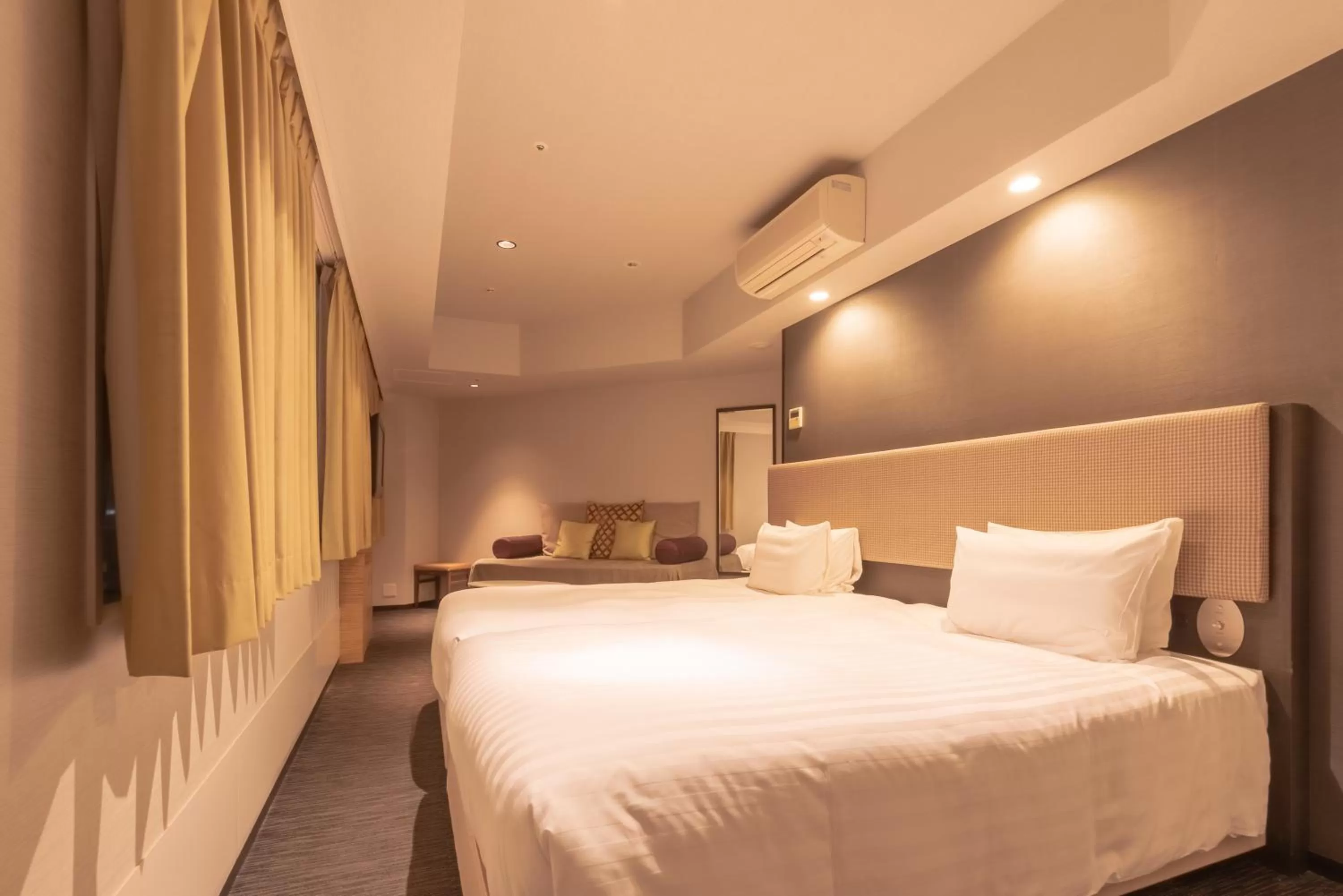 Bed in E Hotel Higashi Shinjuku