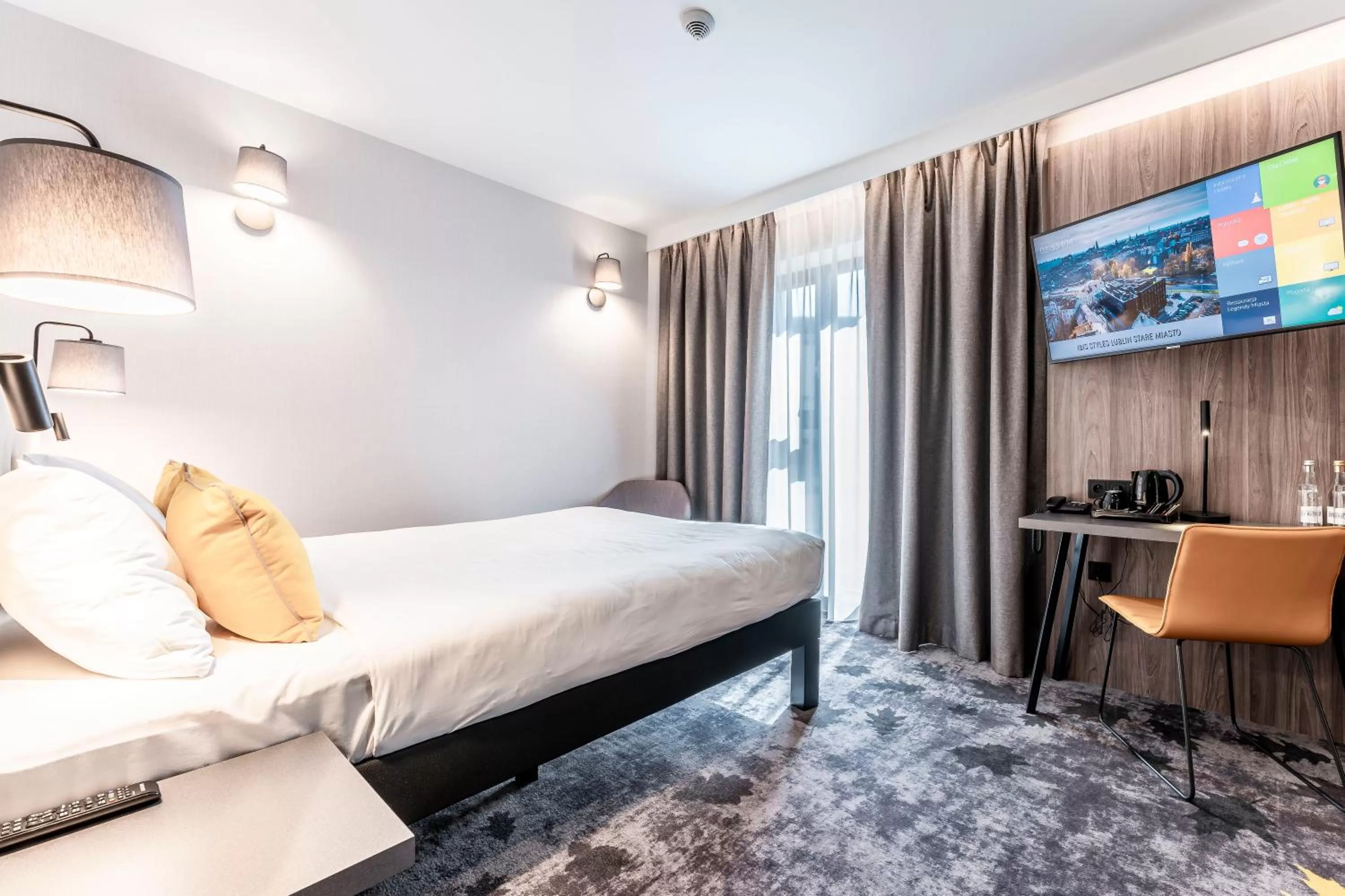 Communal lounge/ TV room, Bed in ibis Styles Lublin Stare Miasto