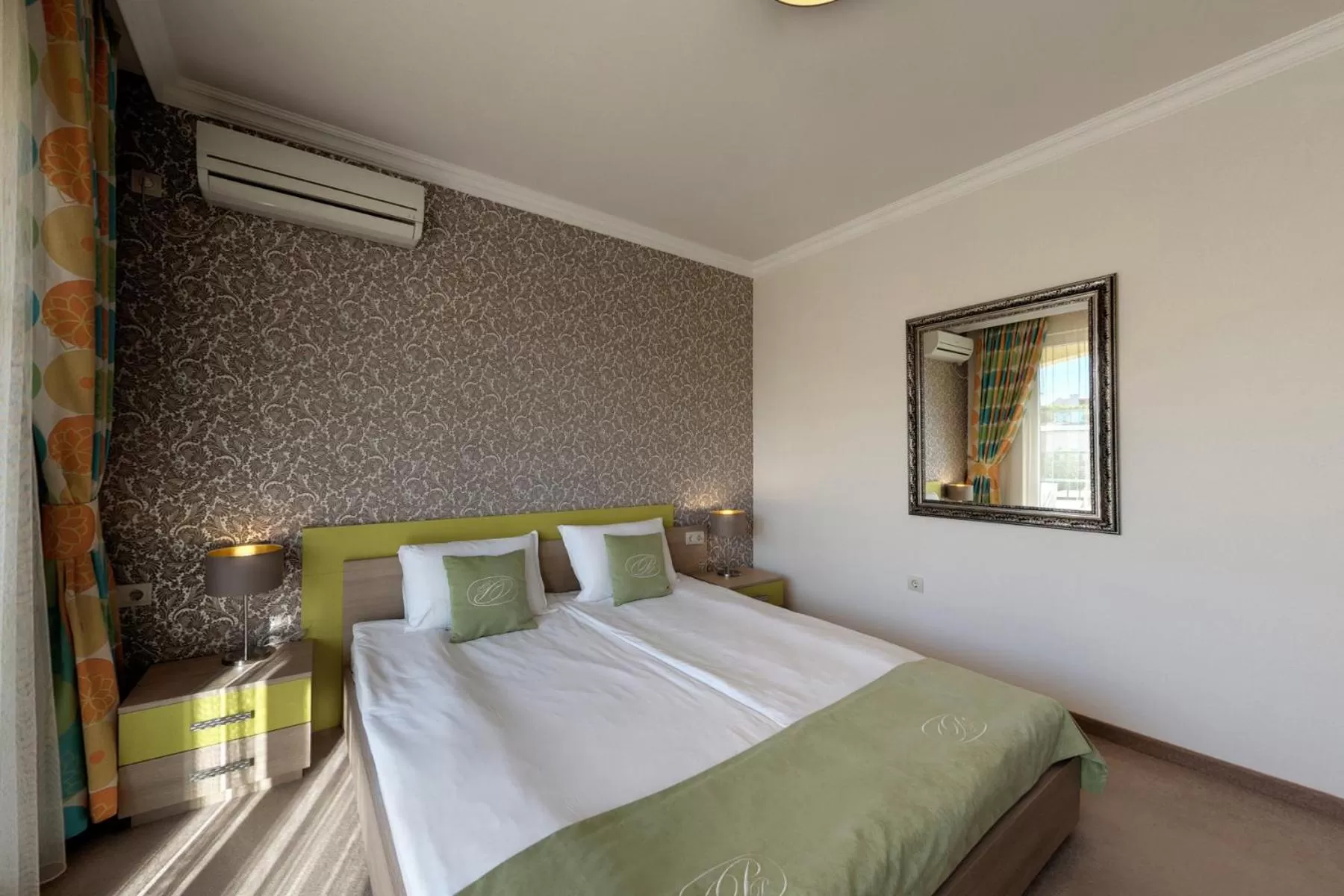 Bed in Penelopa Palace Apart Hotel & SPA