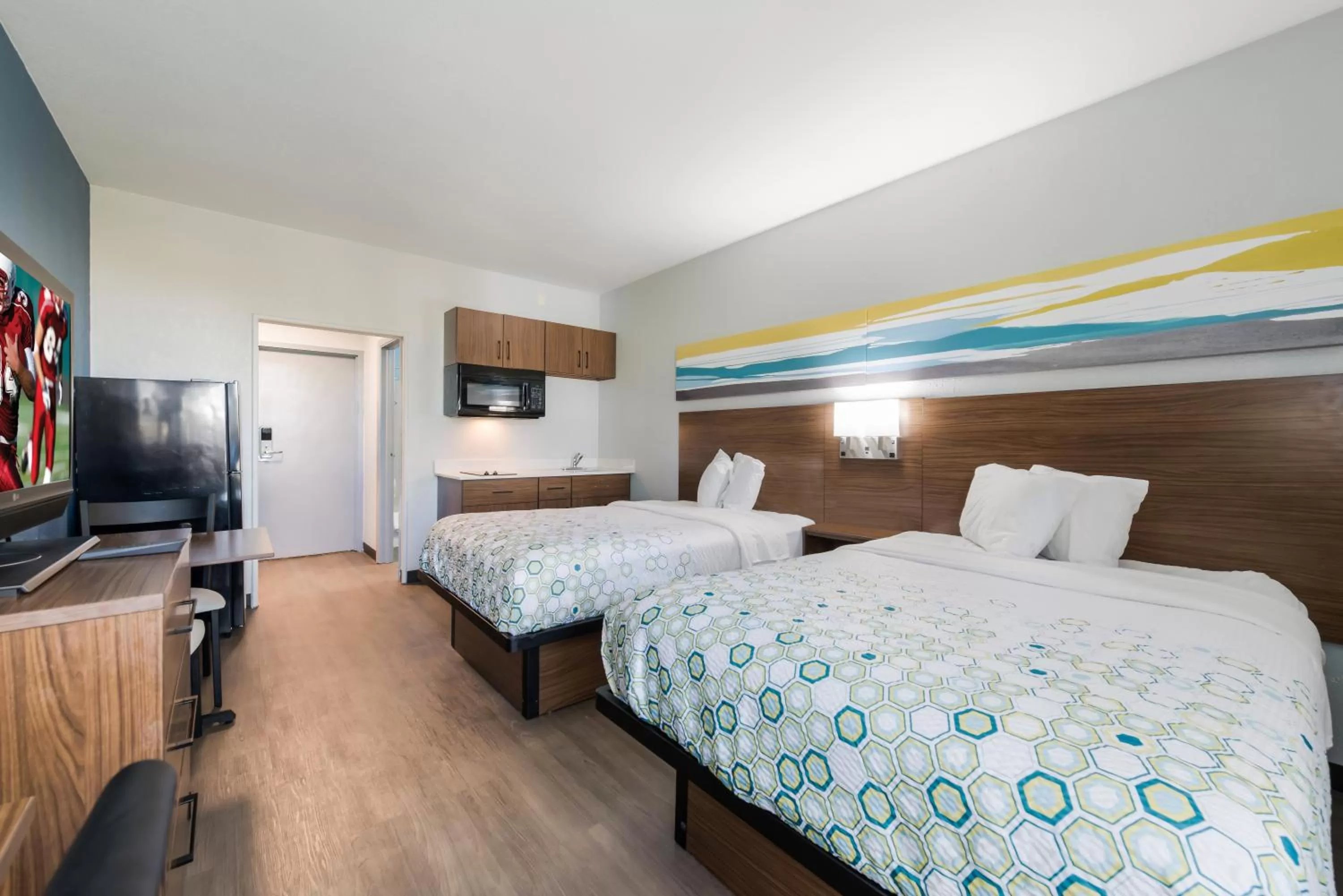 Bedroom, Bed in HomeTowne Studios by Red Roof Newport News - Hampton West