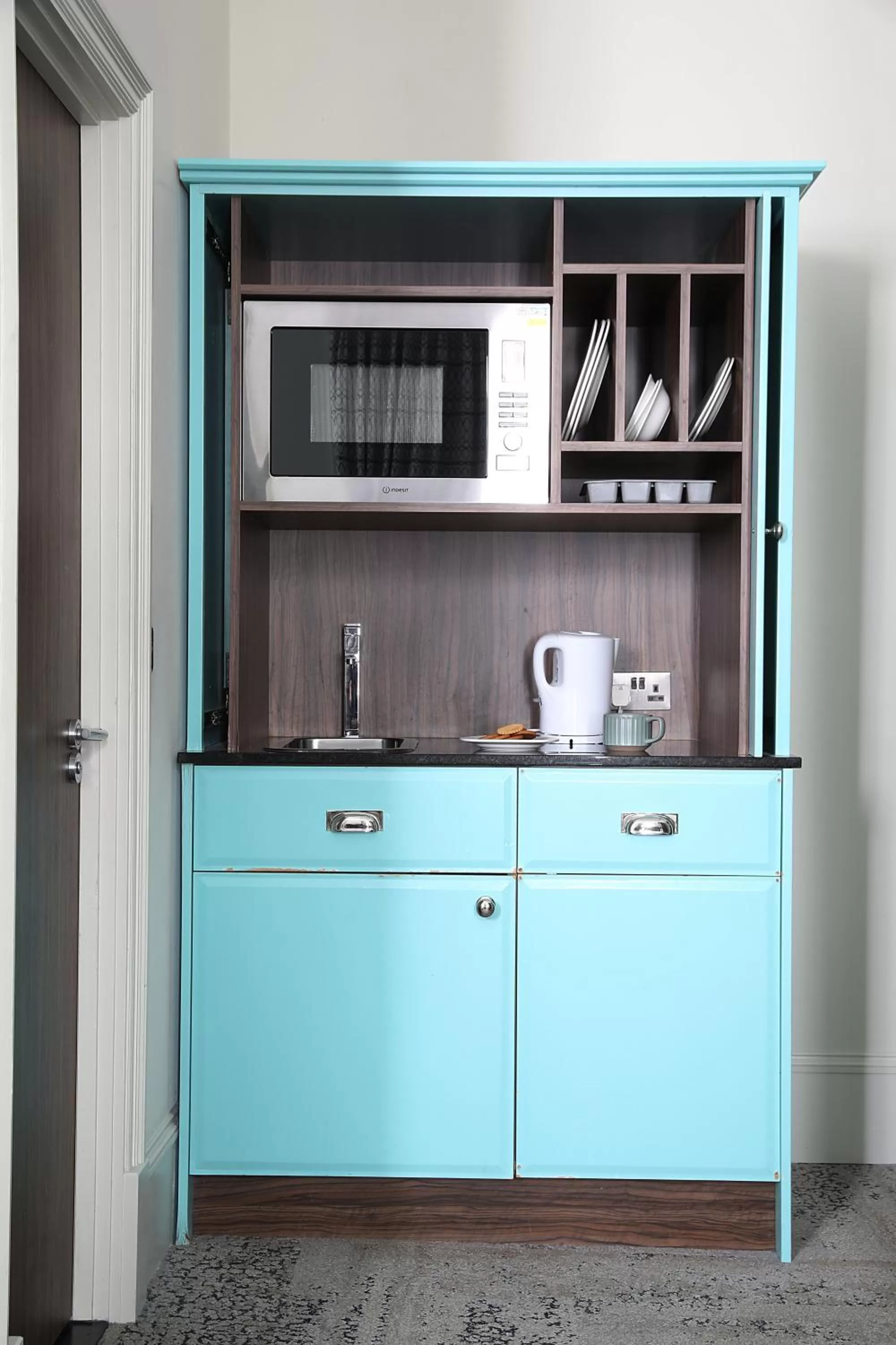 Kitchen or kitchenette in Cairn Hotel & Apartments