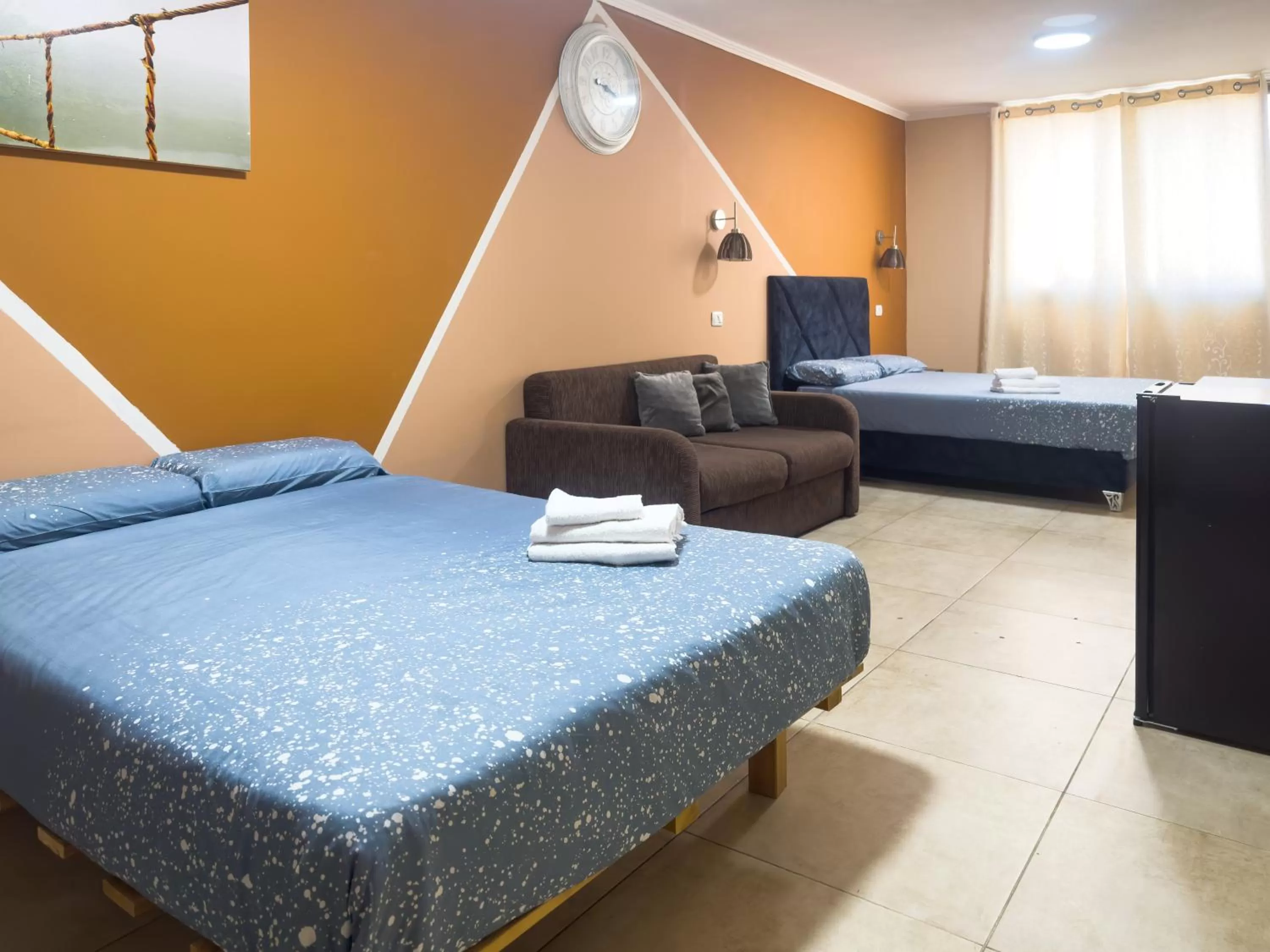 Bed in Central Laguardia Hotel