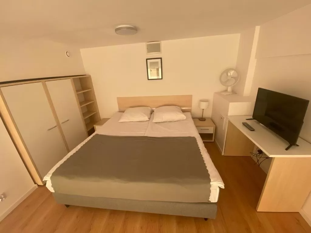 Bedroom, Bed in SleepWell Apartments