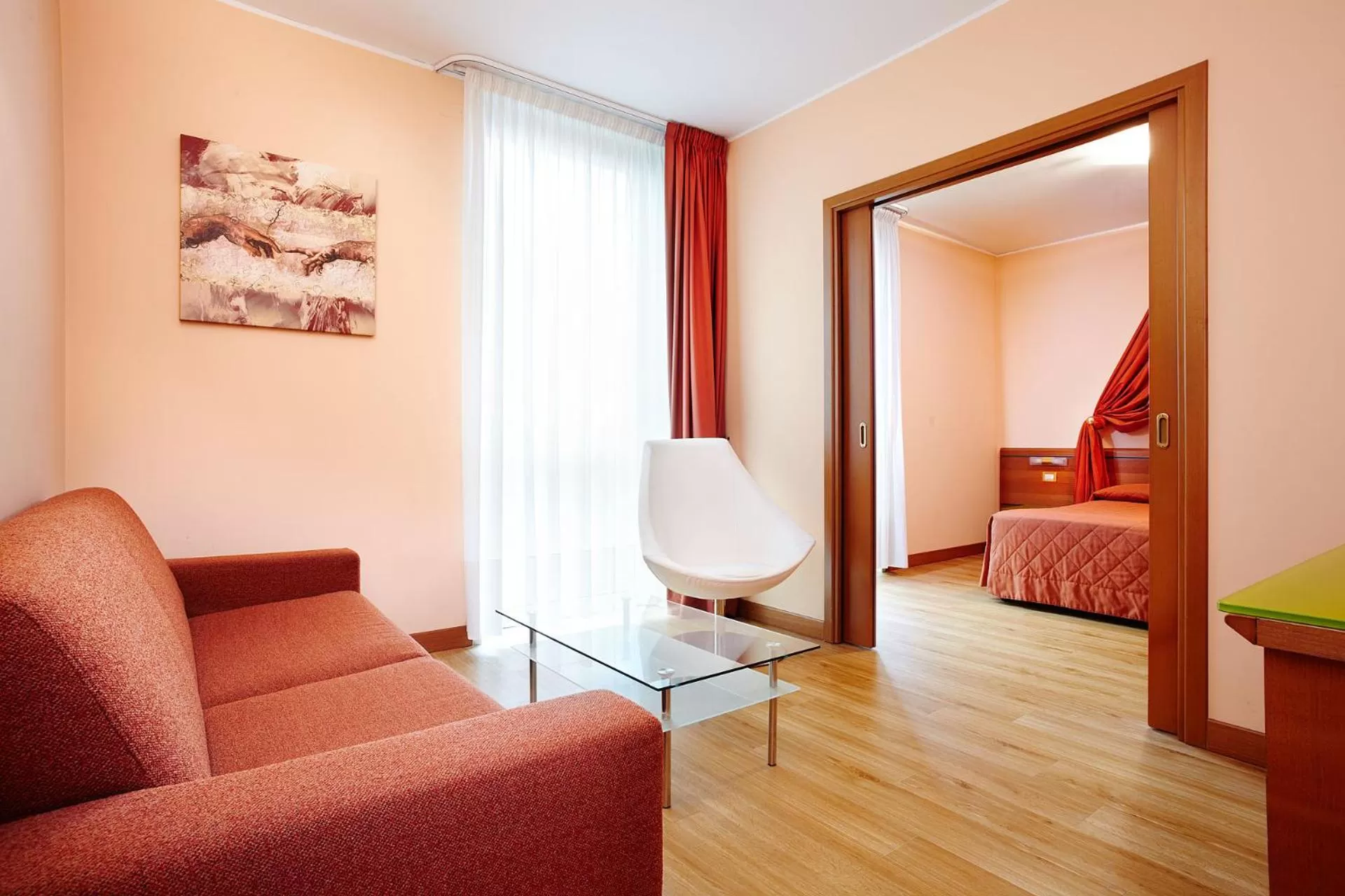 Living room, Bed in Primhotel