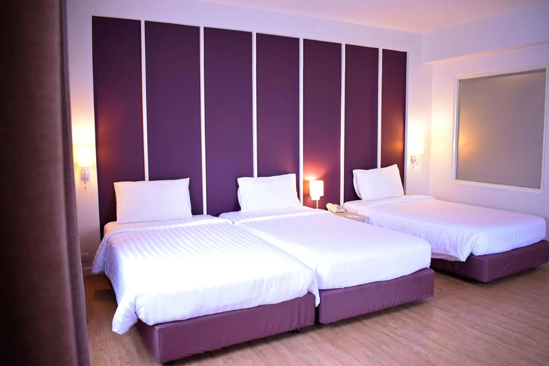 Bed in Trang Hotel Bangkok - SHA Plus