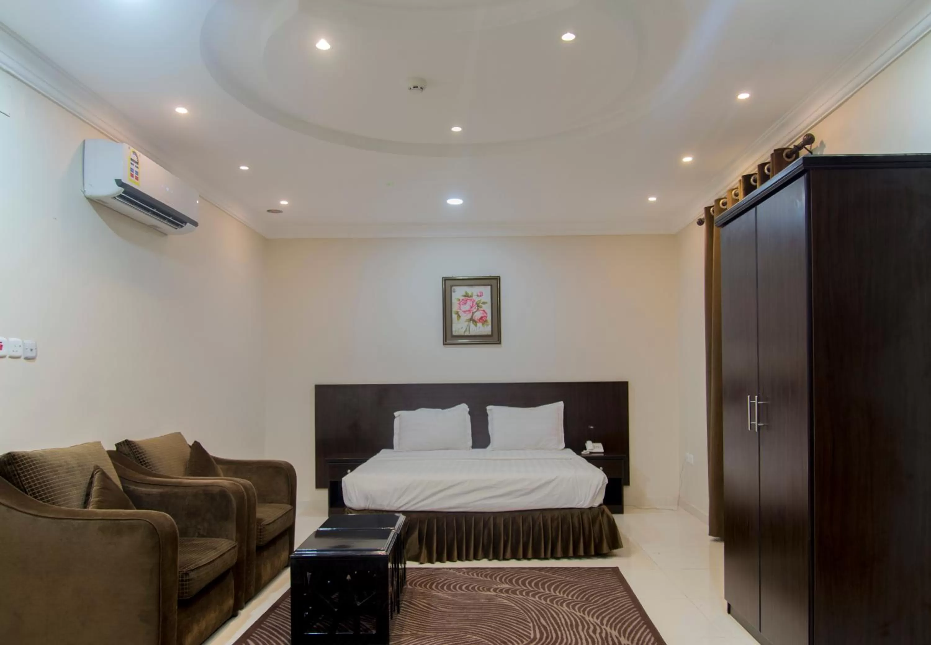 Bedroom, Bed in Shams Suites Furnished Units