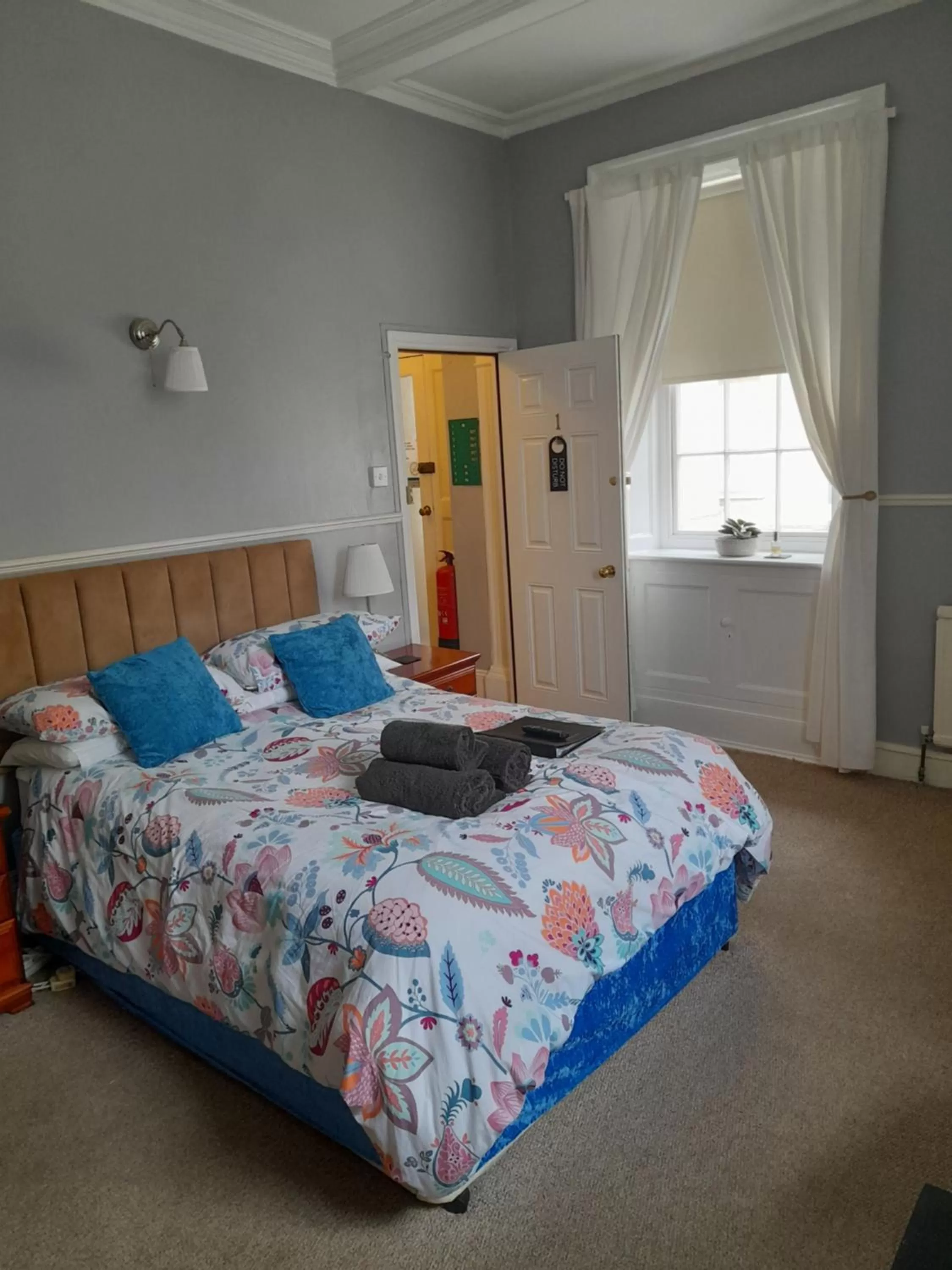 Bed in Valentine Guest House