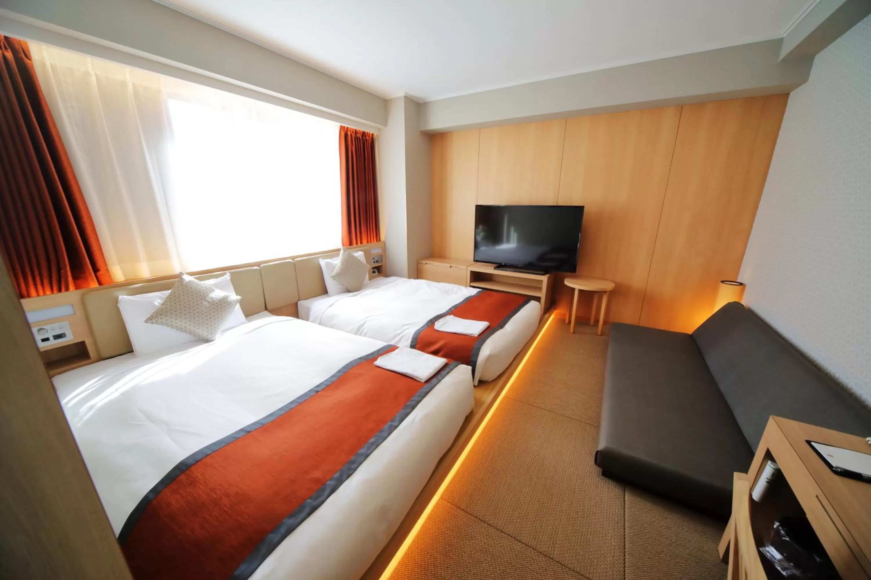 Bed in Hotel Sunroute Asakusa