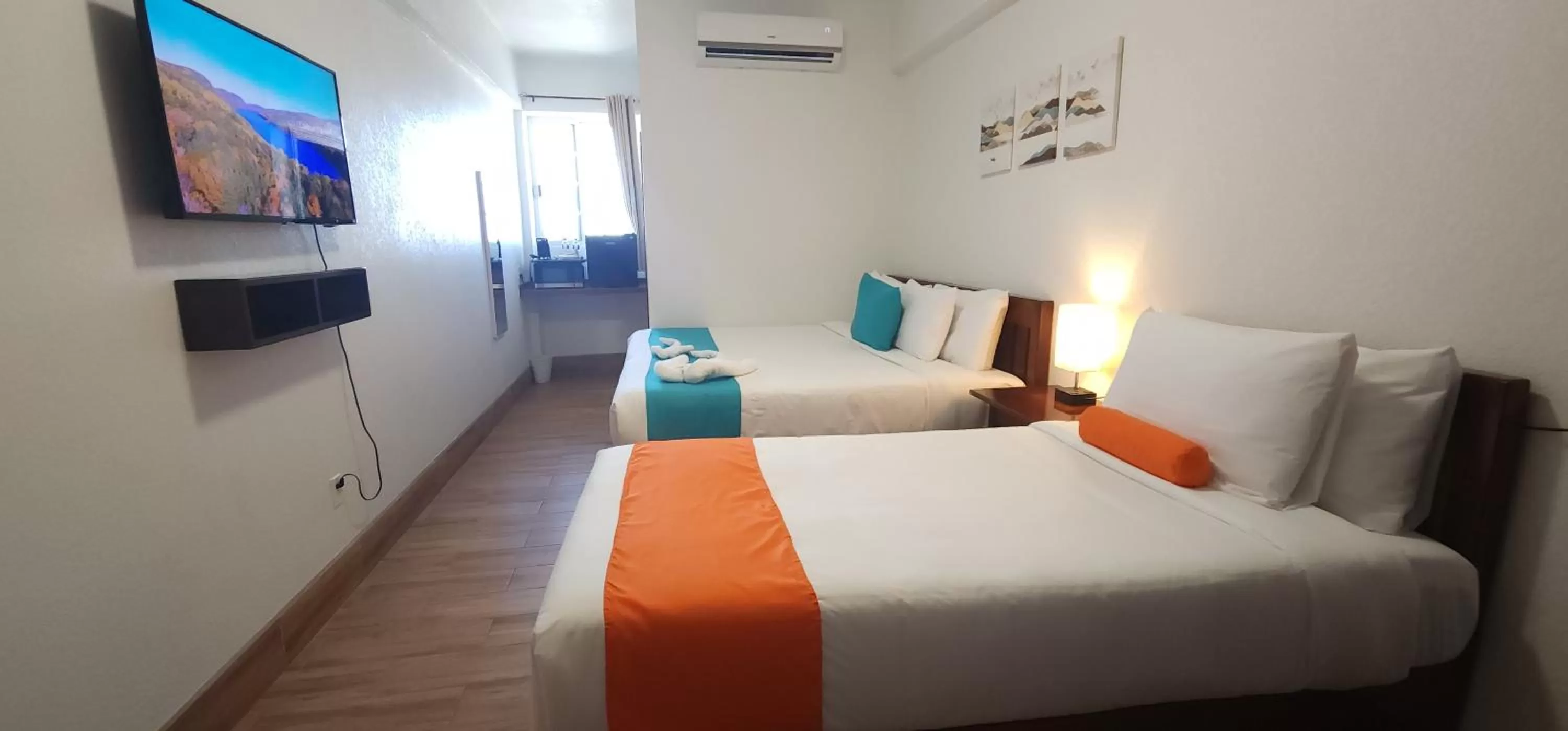 Bed in Voyager Sun & Reef Hotel