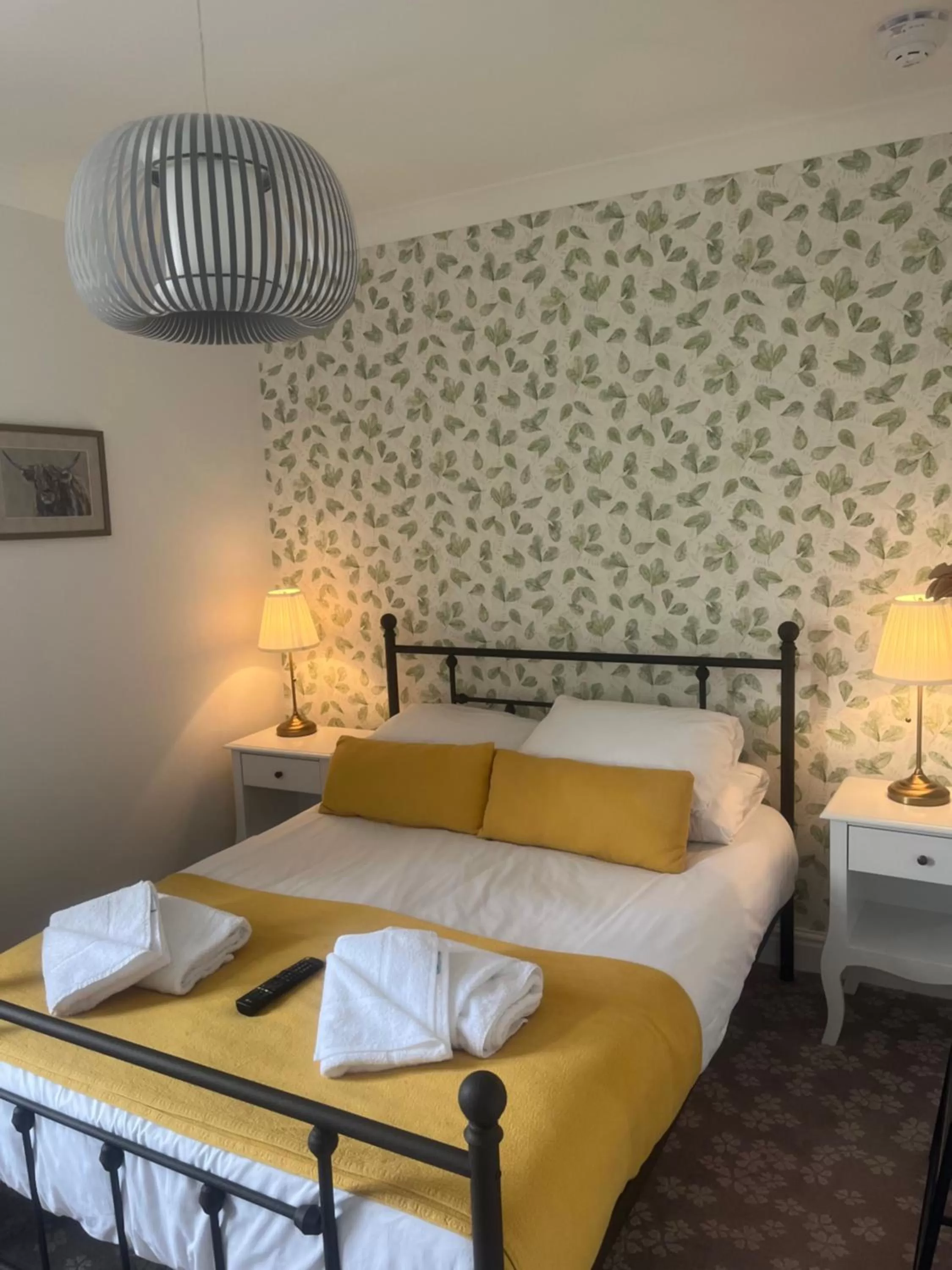 Bed in Penny Farthing Hotel & Cottages