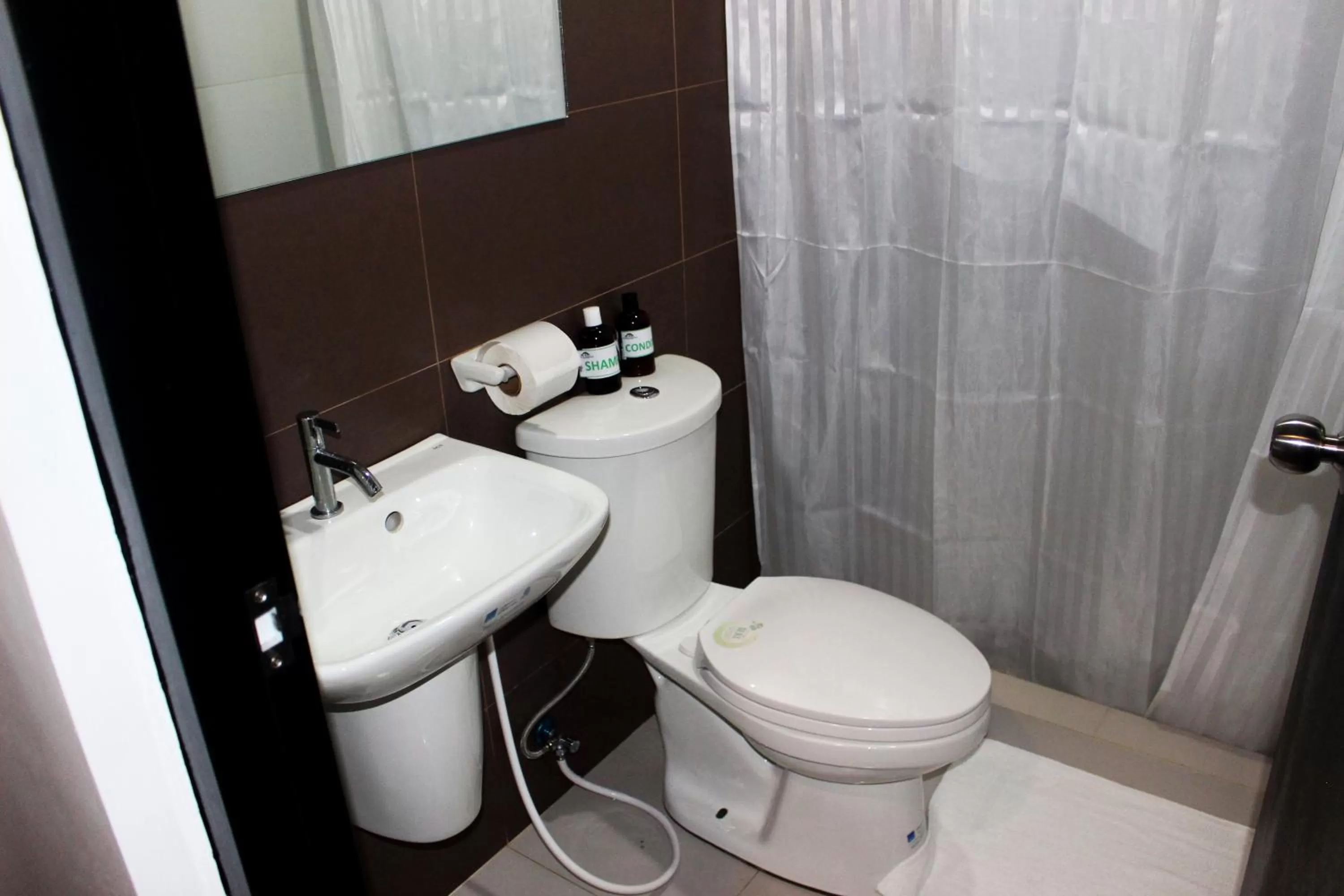 Shower in Acacia Garden Inn and Suites