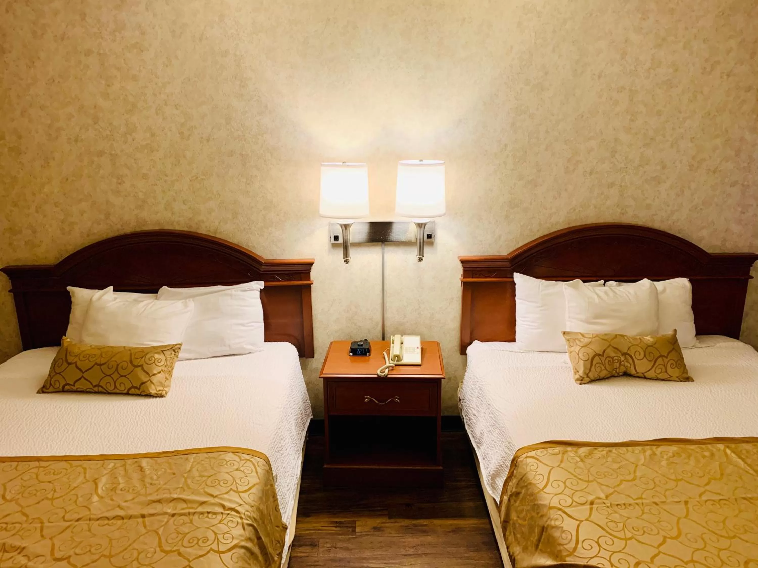 Bed in St. George Inn and Suites