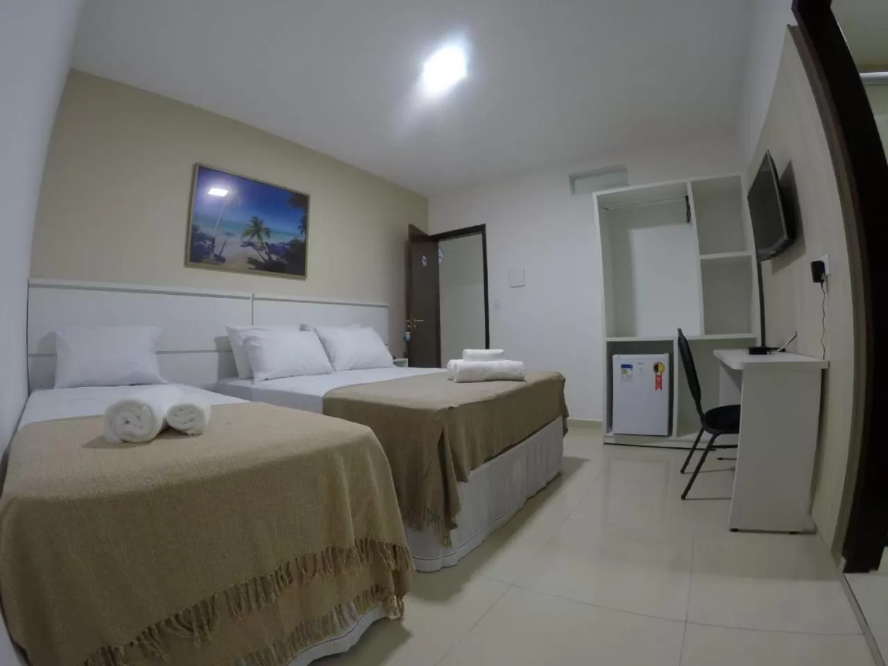 Bed in Pousada Kanoas