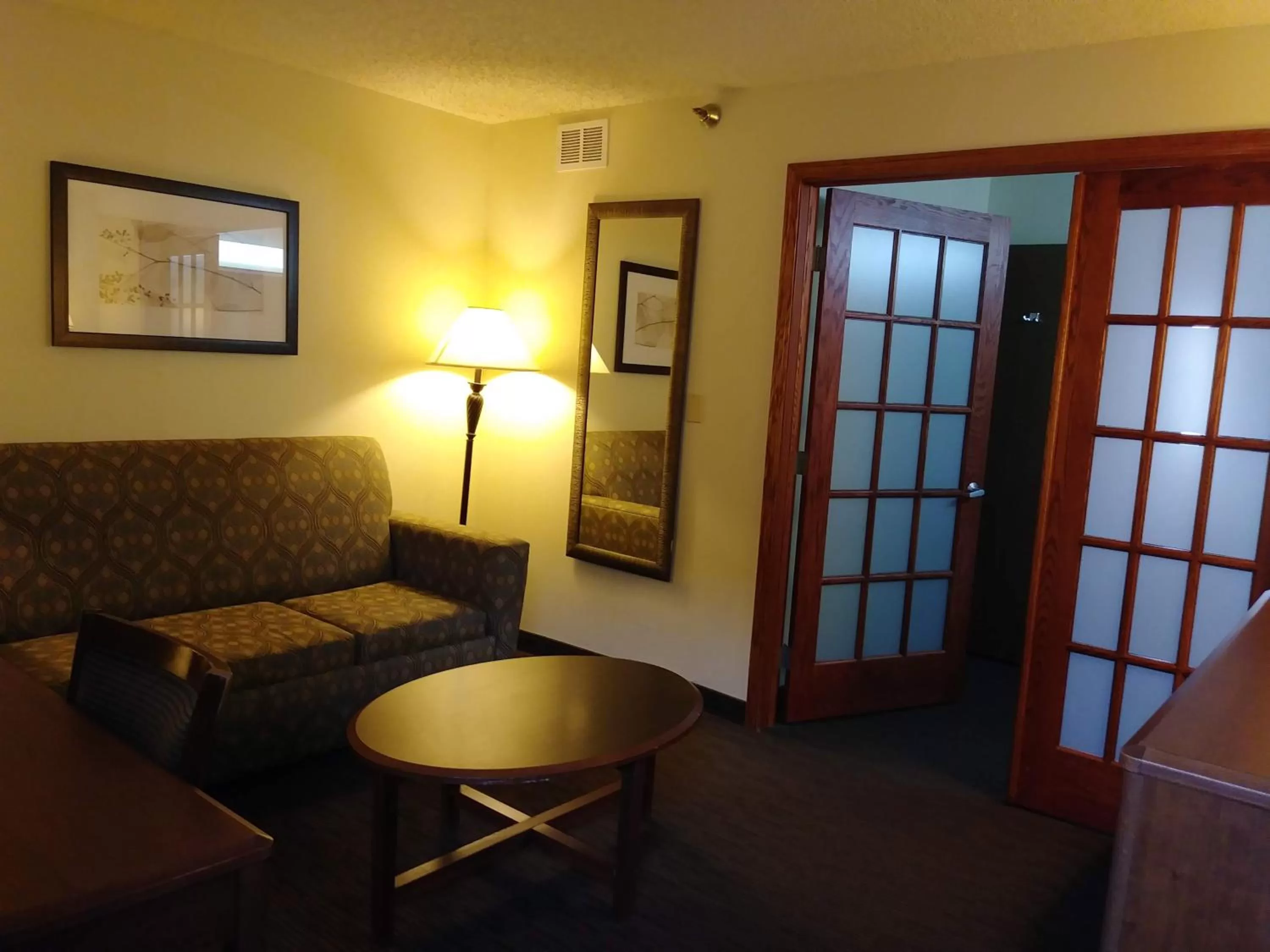 Living room in AmericInn by Wyndham Windsor Ft. Collins