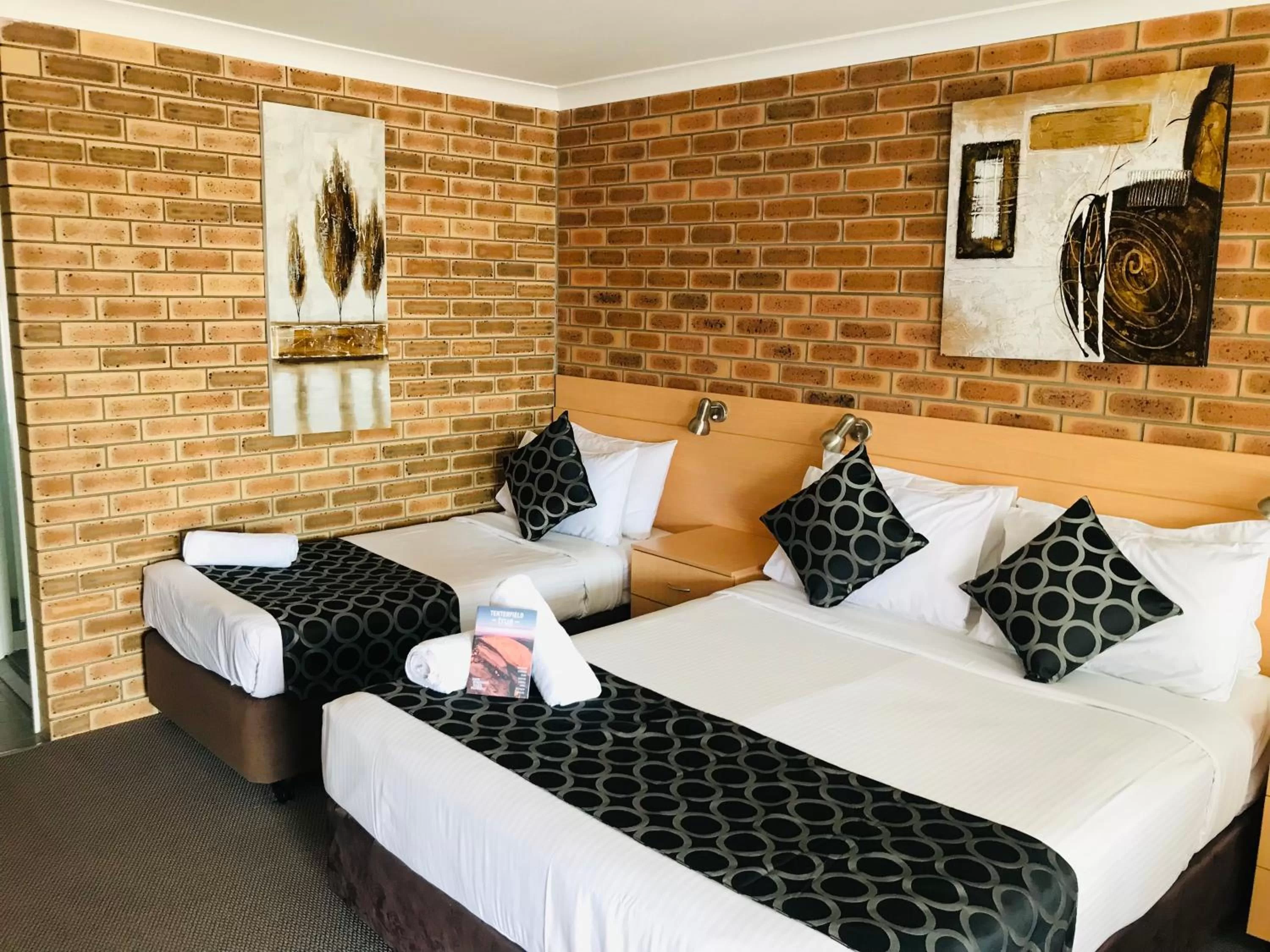 Bed in Jumbuck Motor Inn