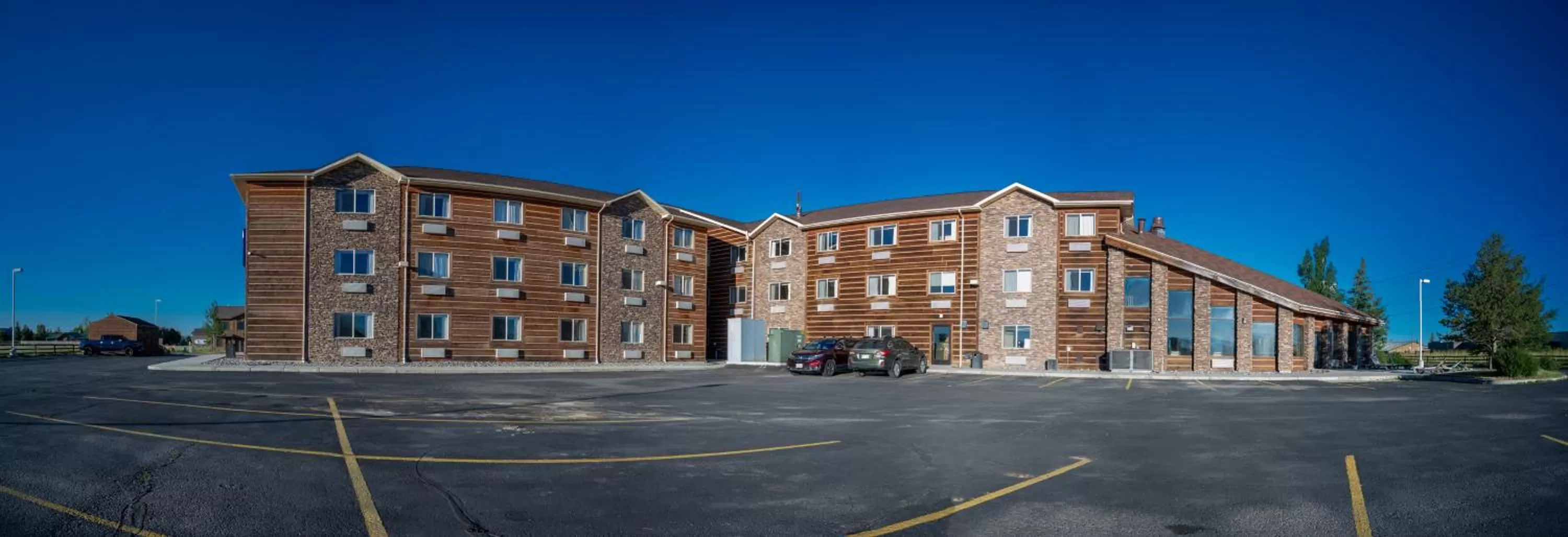 Property building in Pinedale Hotel & Suites