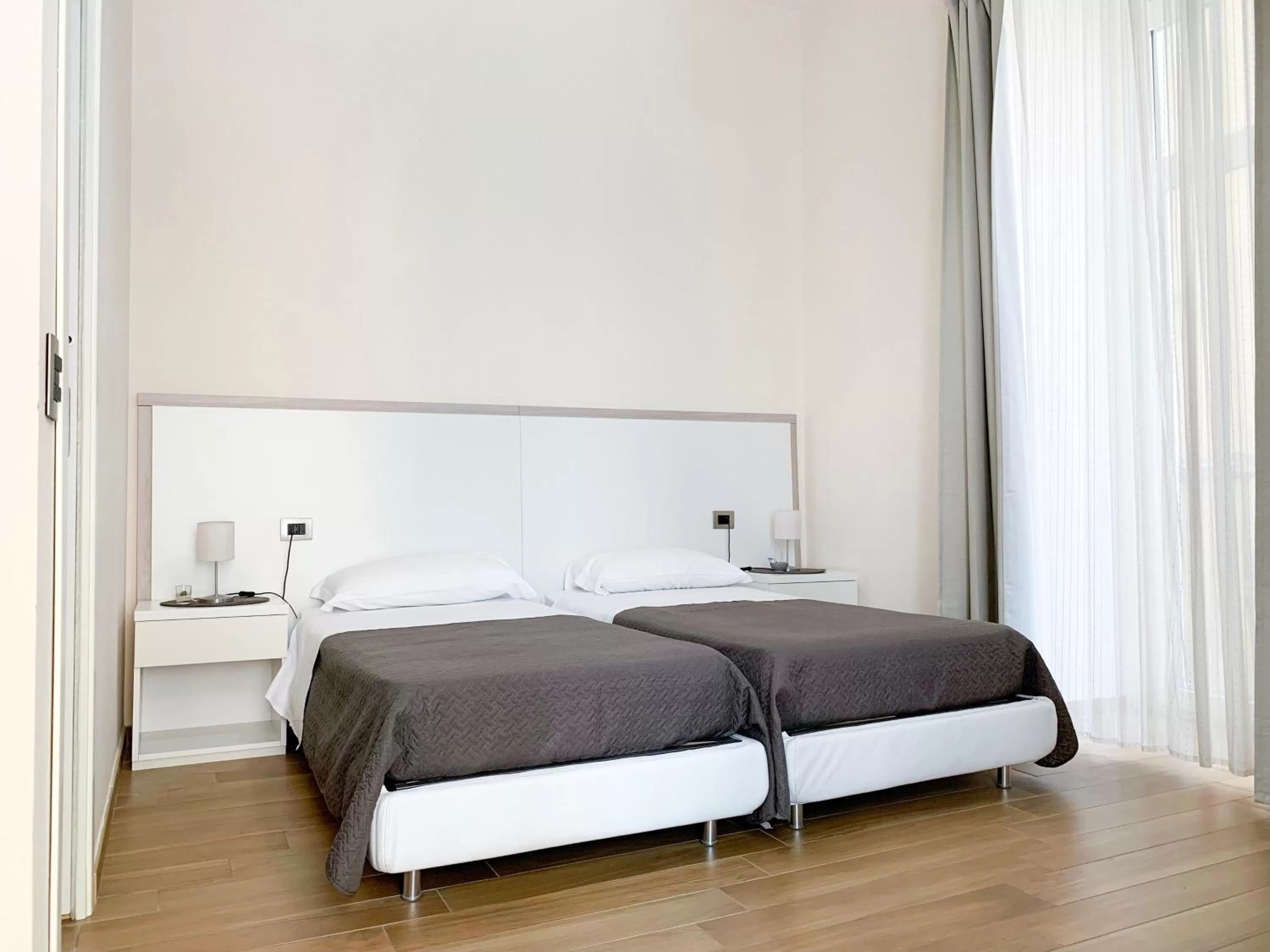 Twin Room in Musto Suites & Rooms