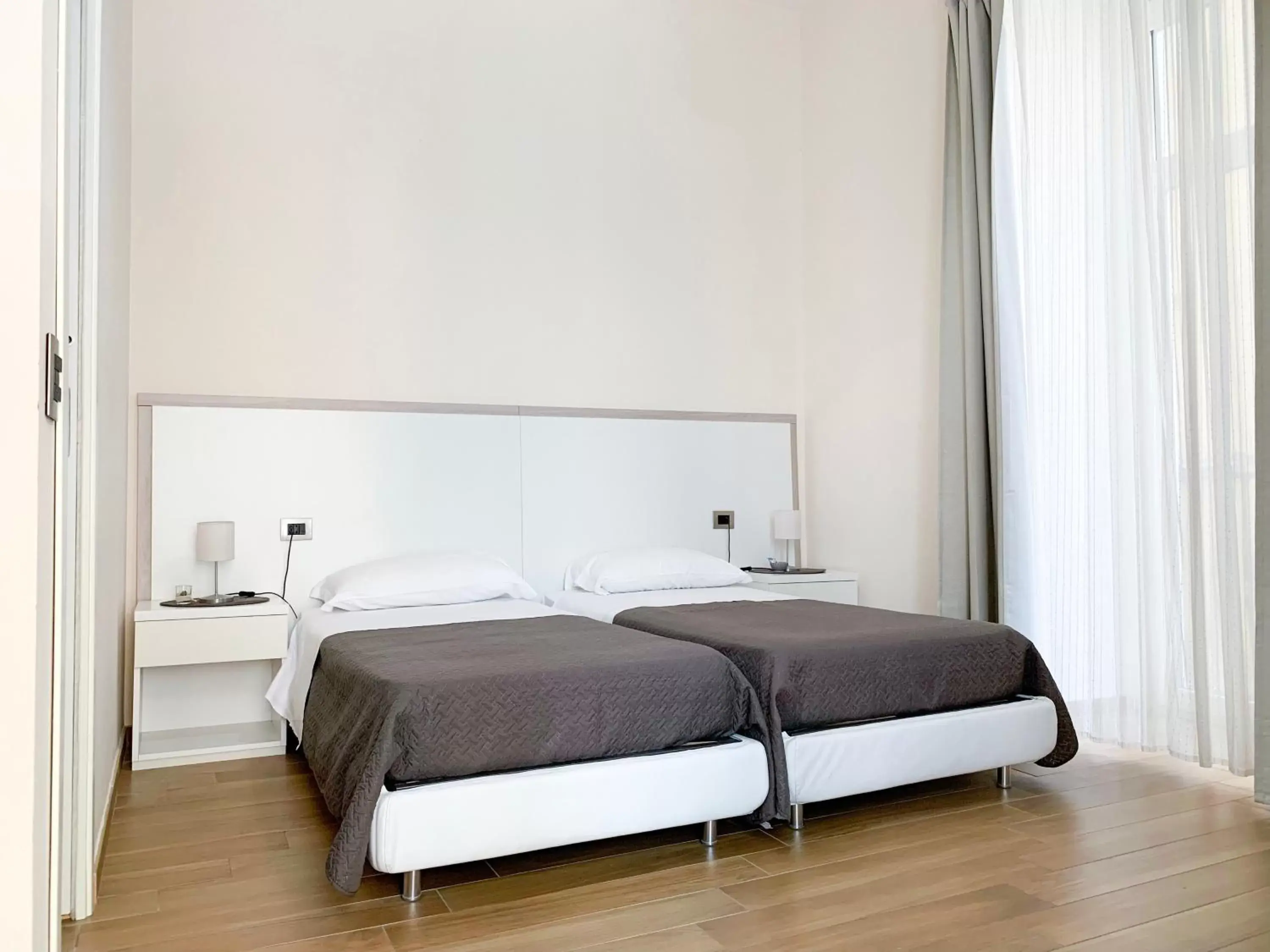 Twin Room in Musto Suites & Rooms Twin Room in Musto Suites & Rooms