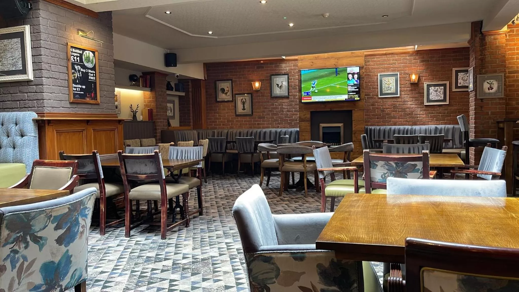 Communal lounge/ TV room in The Grey Horse