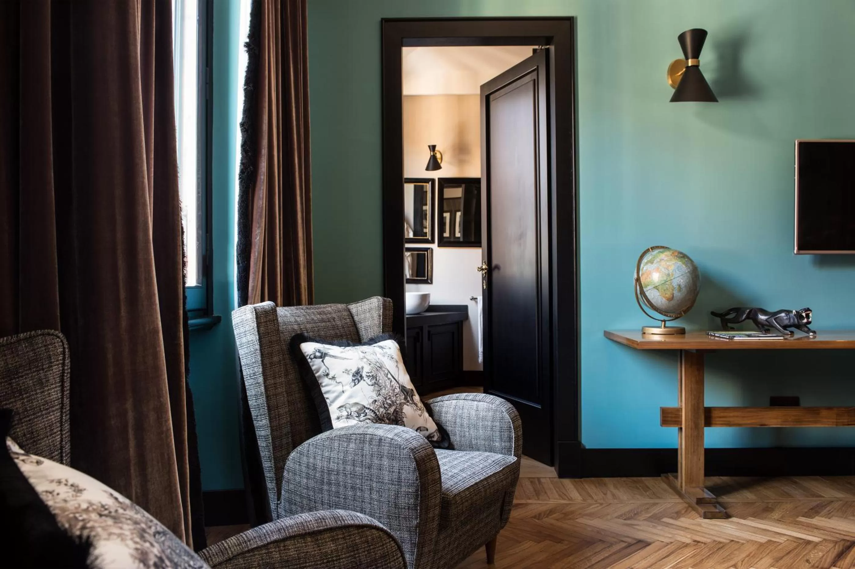 Seating area in Velona's Jungle Luxury Suites