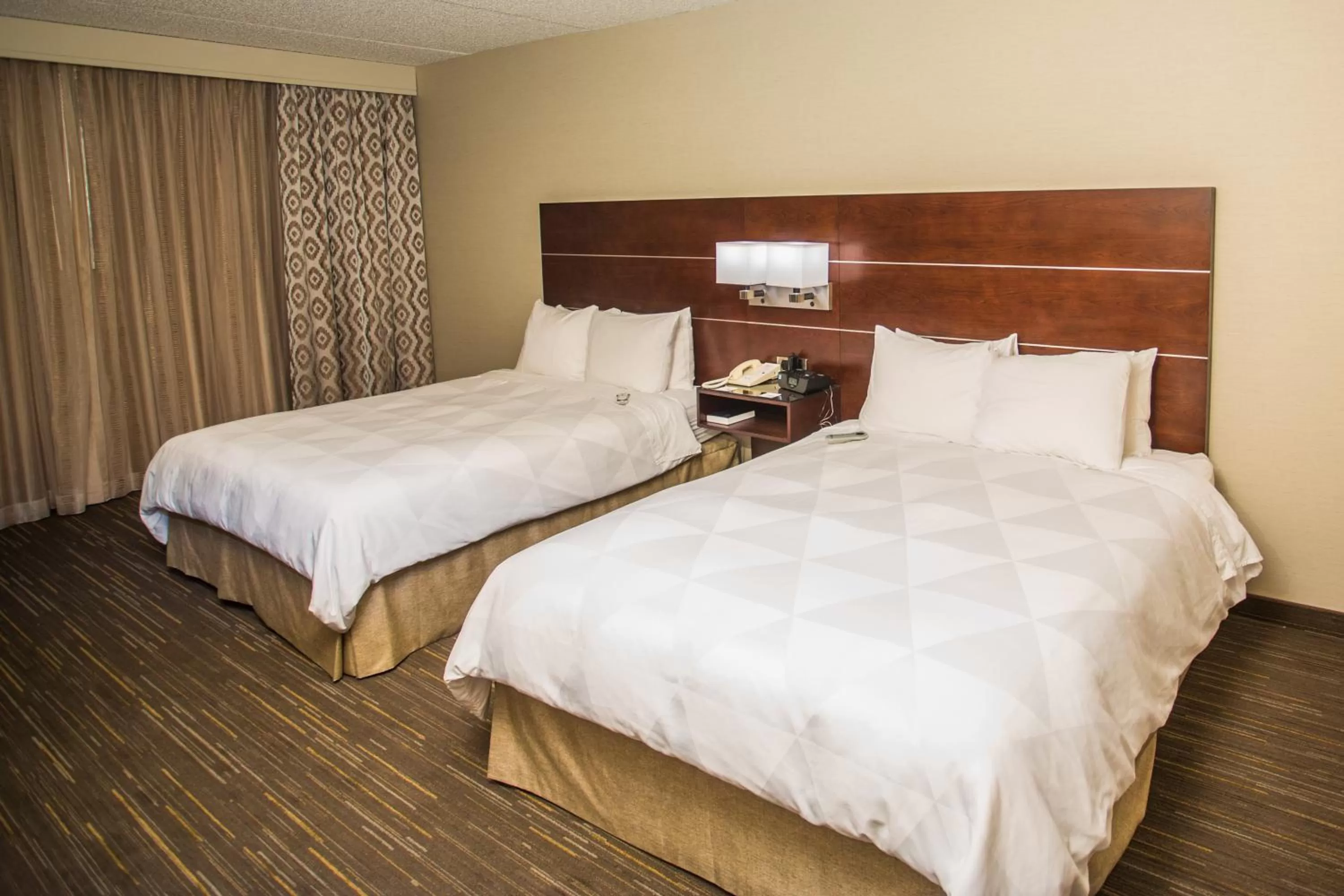 Bedroom, Bed in Wyndham Moline on John Deere Commons