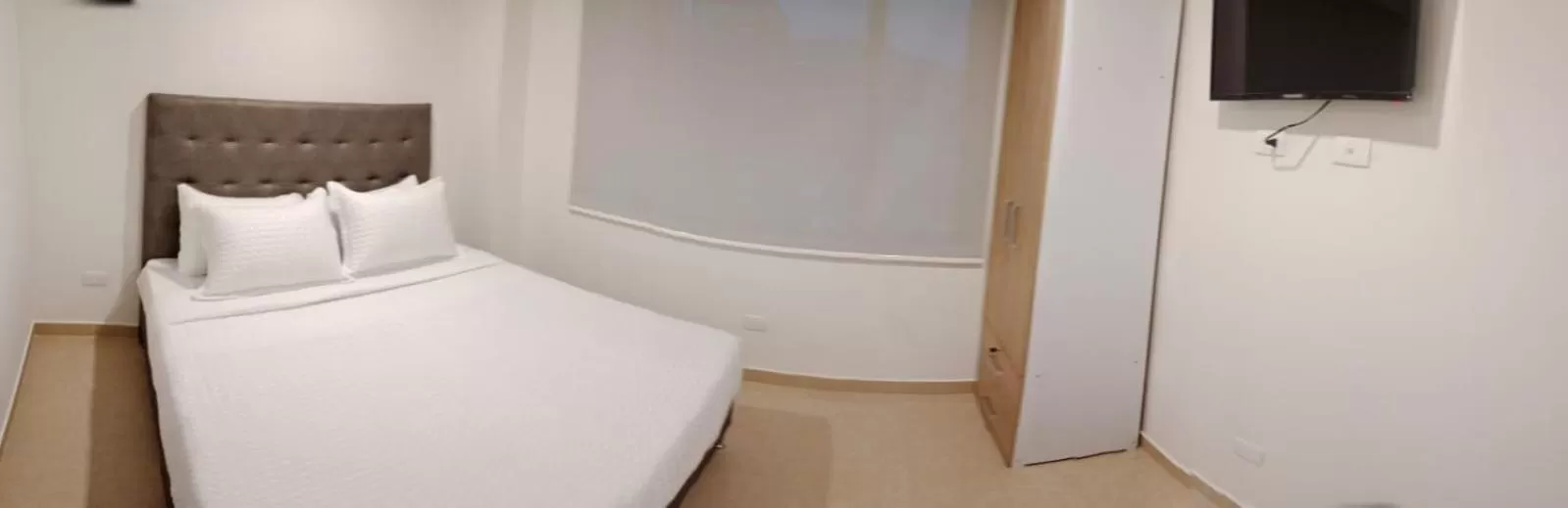 Photo of the whole room, Bed in Aparta Suite Plaza Premium by Tourism Yossa