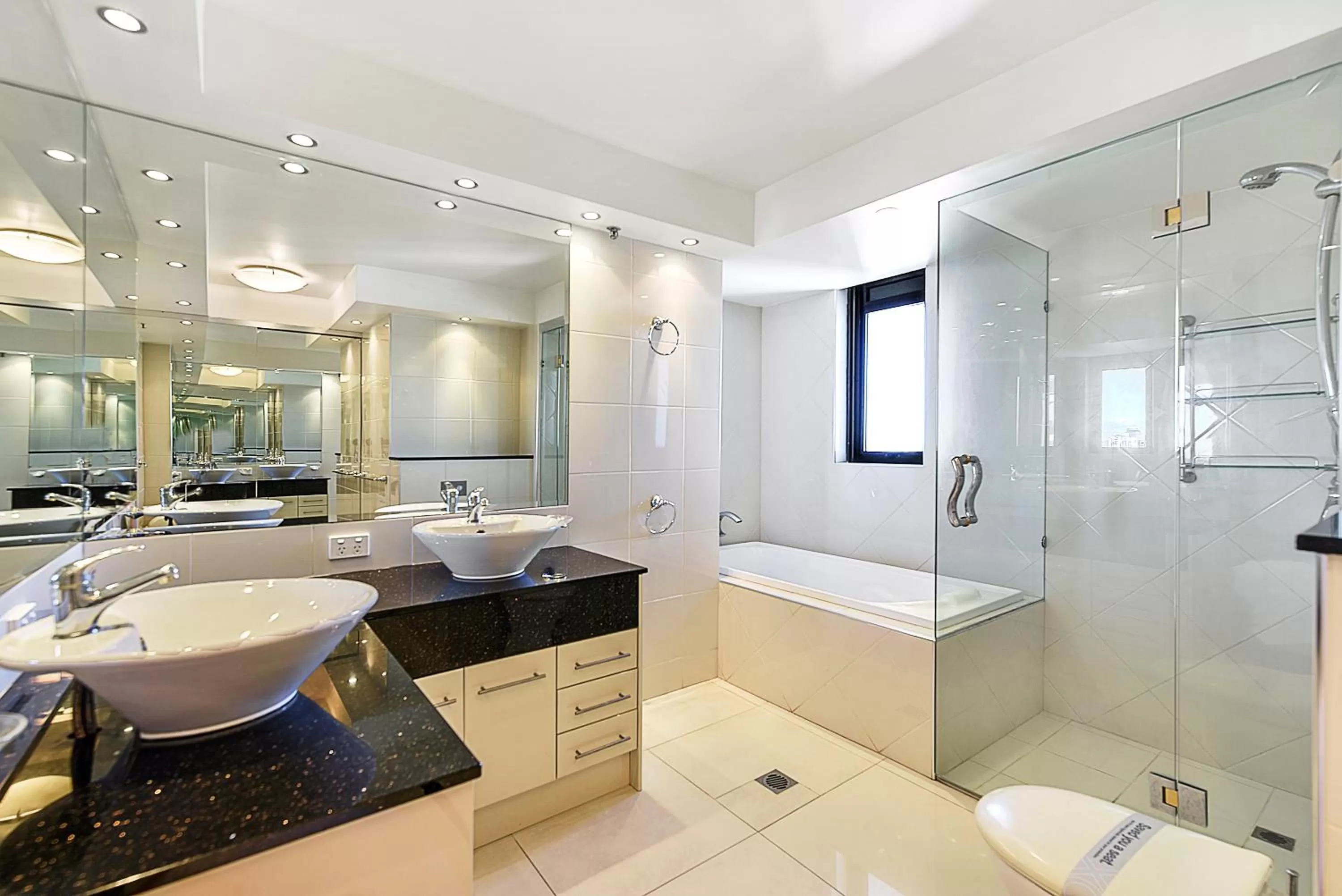 Bathroom in Surfers Century Oceanside Apartments