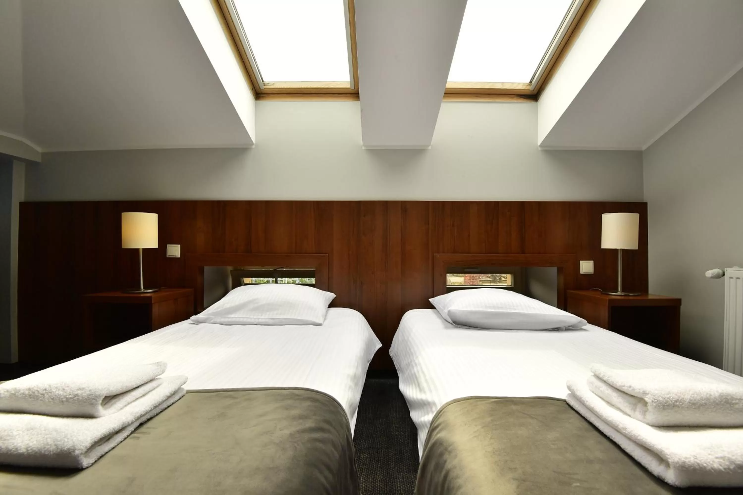 Bed in Hotel Downtown Kraków