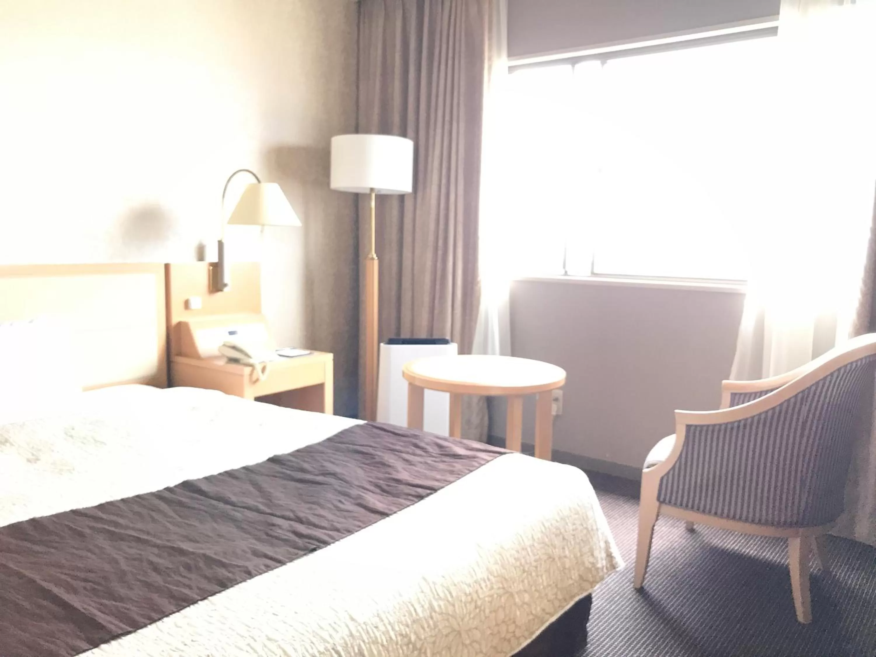 Bed in Numazu River Side Hotel