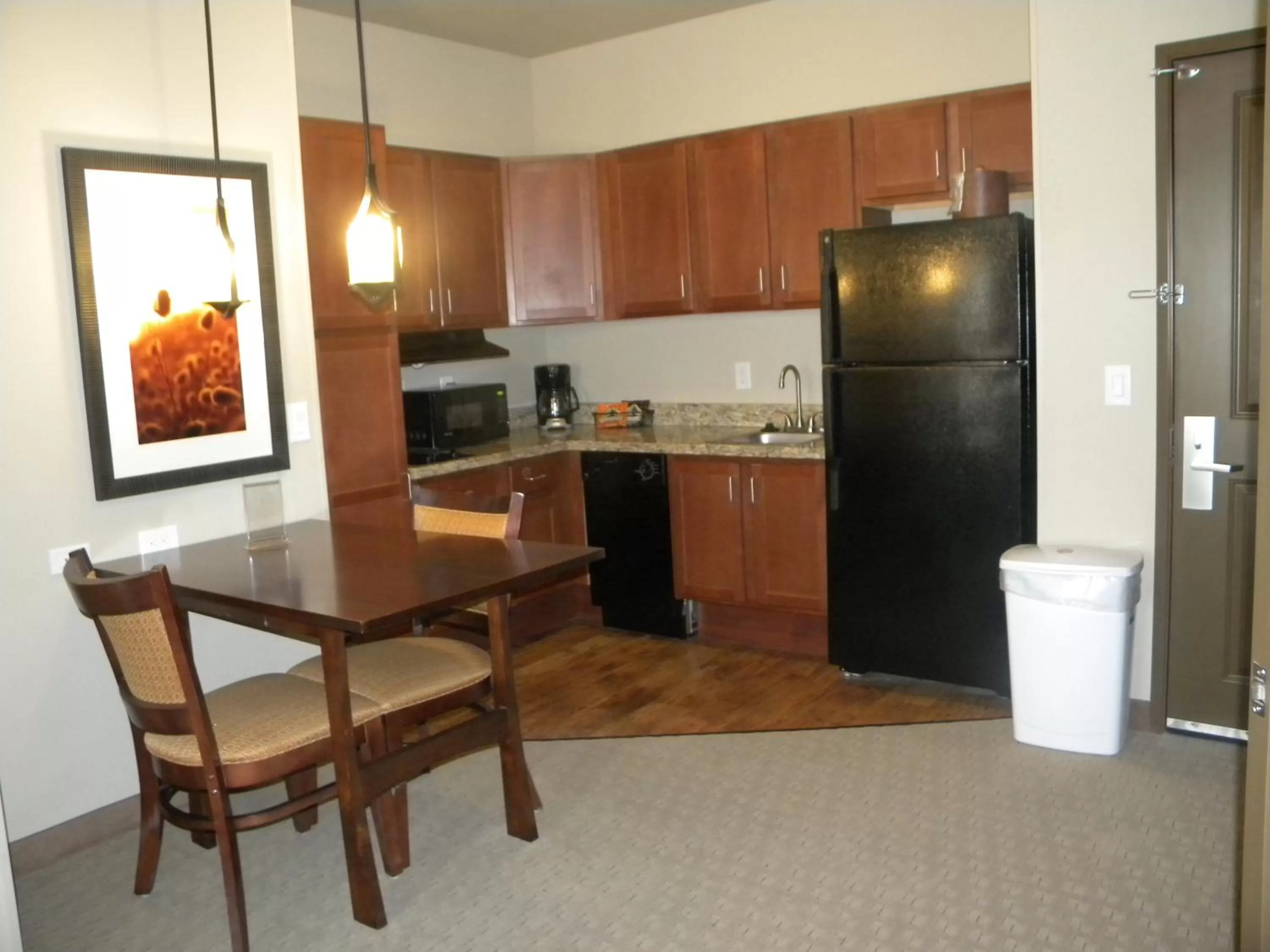Kitchen or kitchenette in Teddy's Residential Suites Watford City