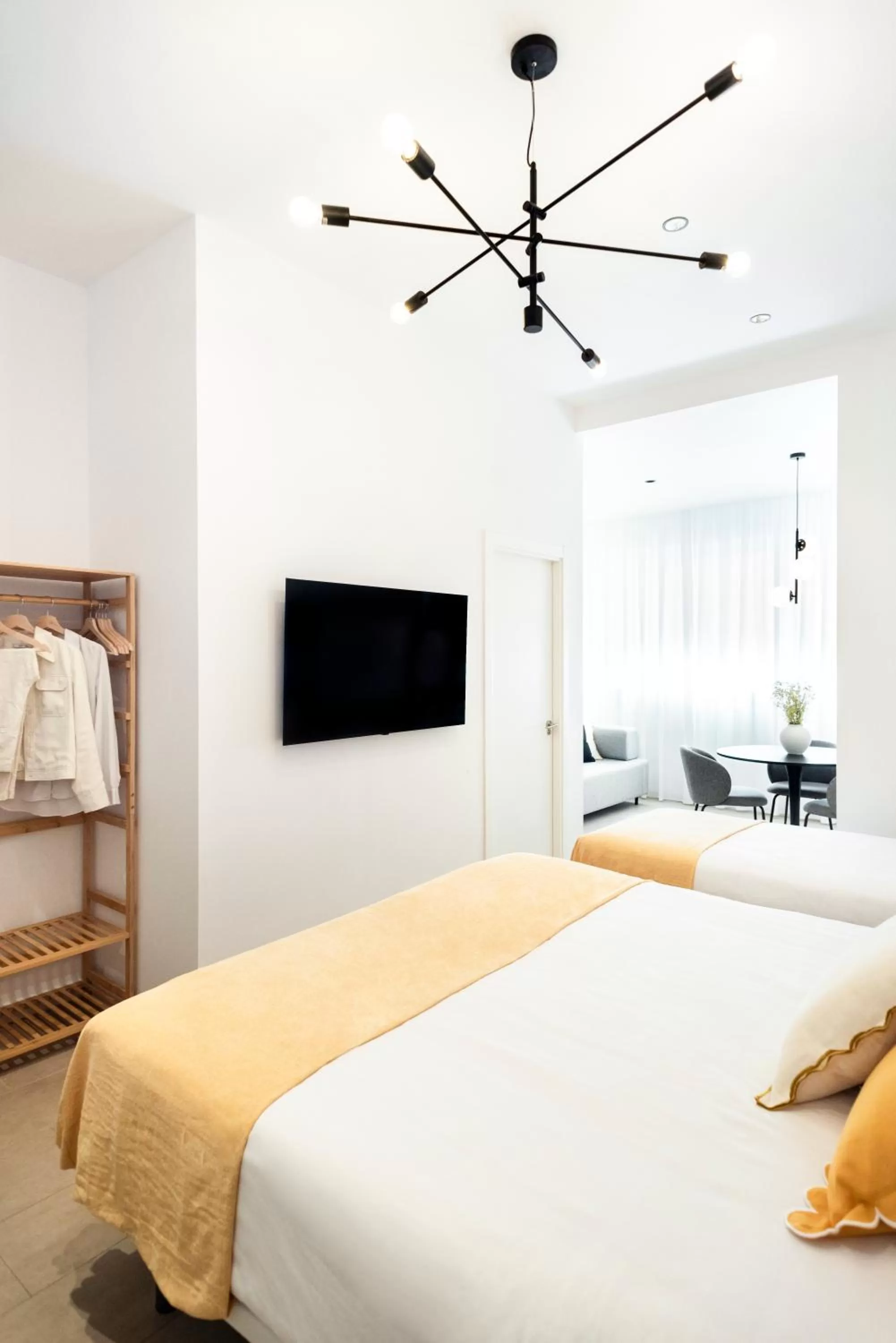 Communal lounge/ TV room, Bed in Blanq Marina Suites