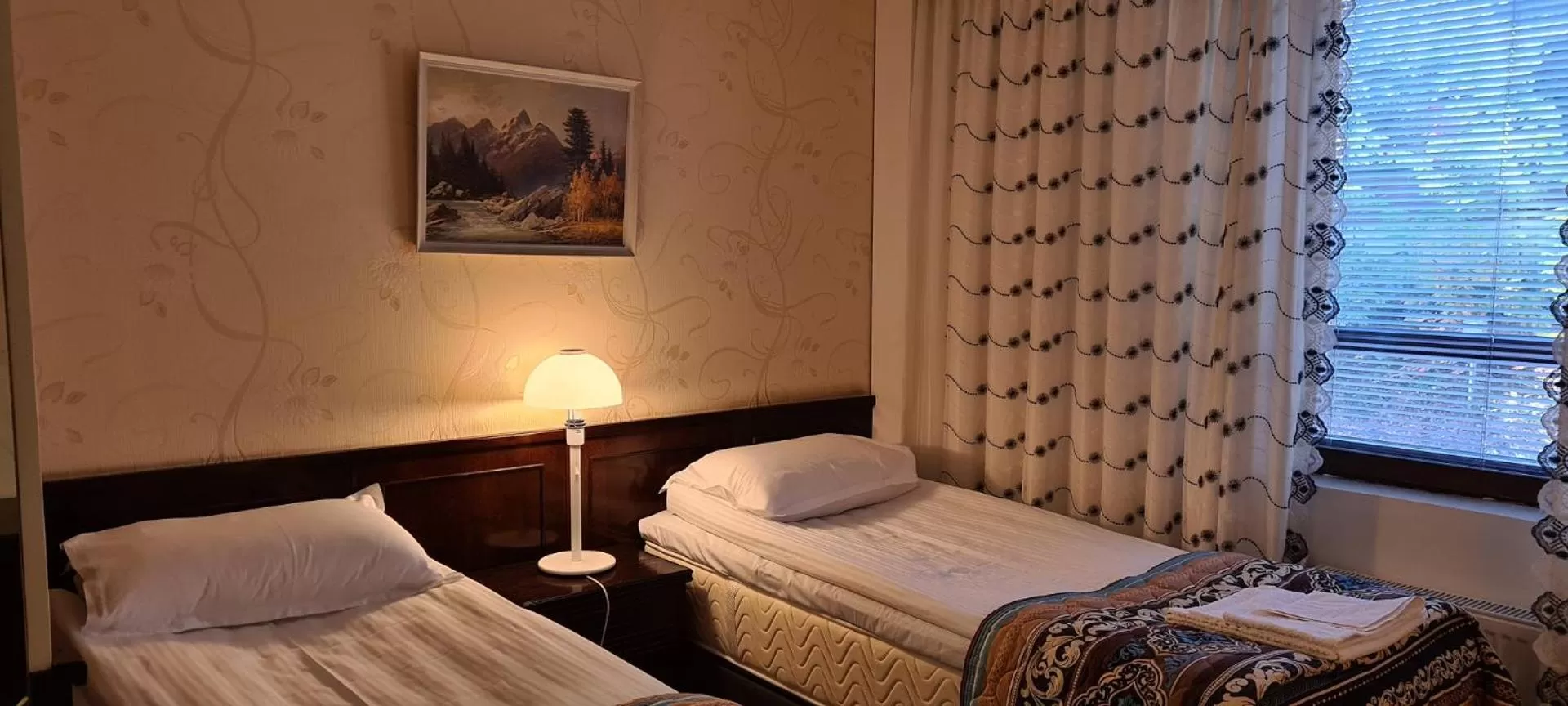 Bed in Hotelli Sandels