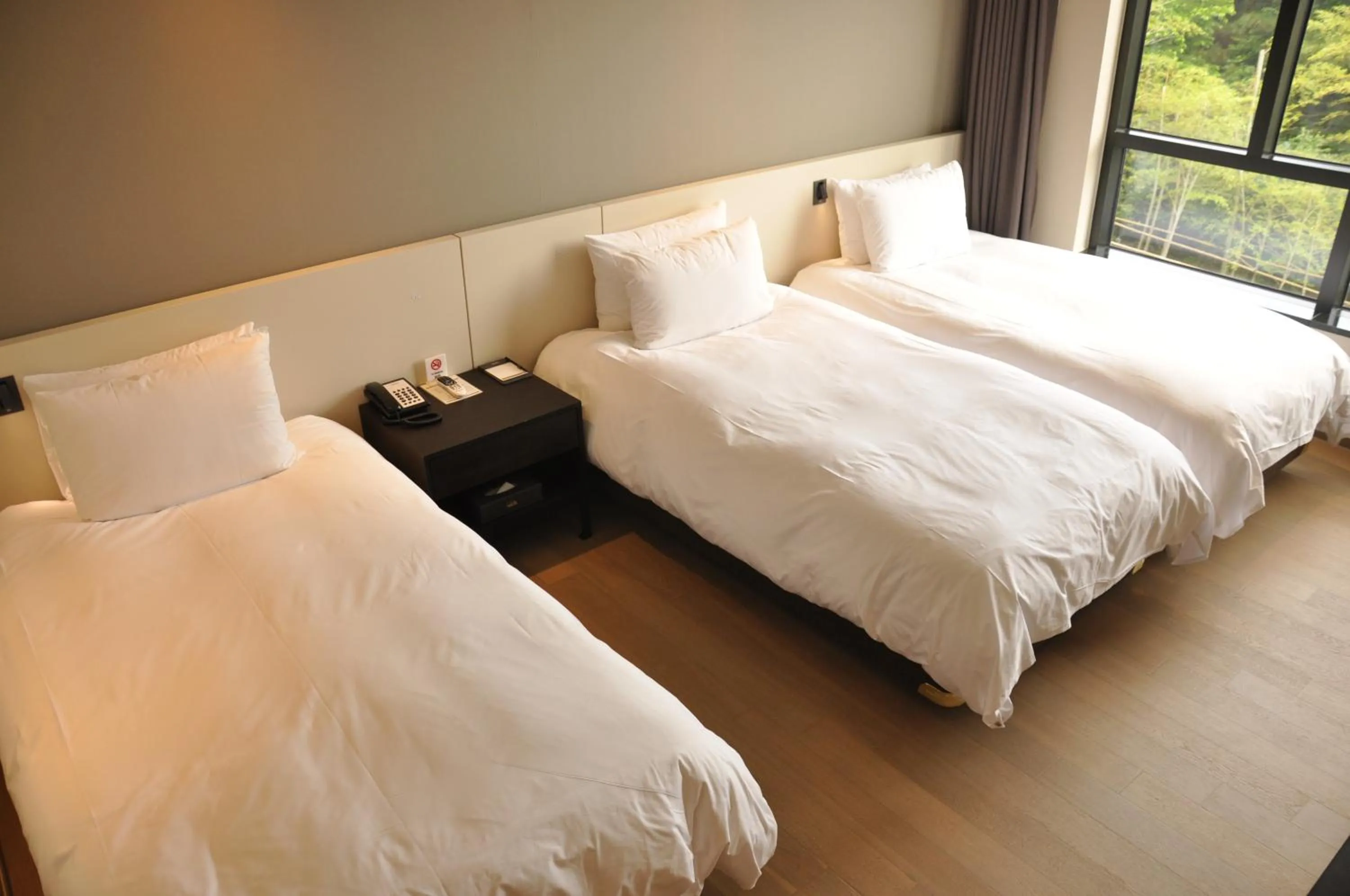 Bed in Hotel Nanta Jeju