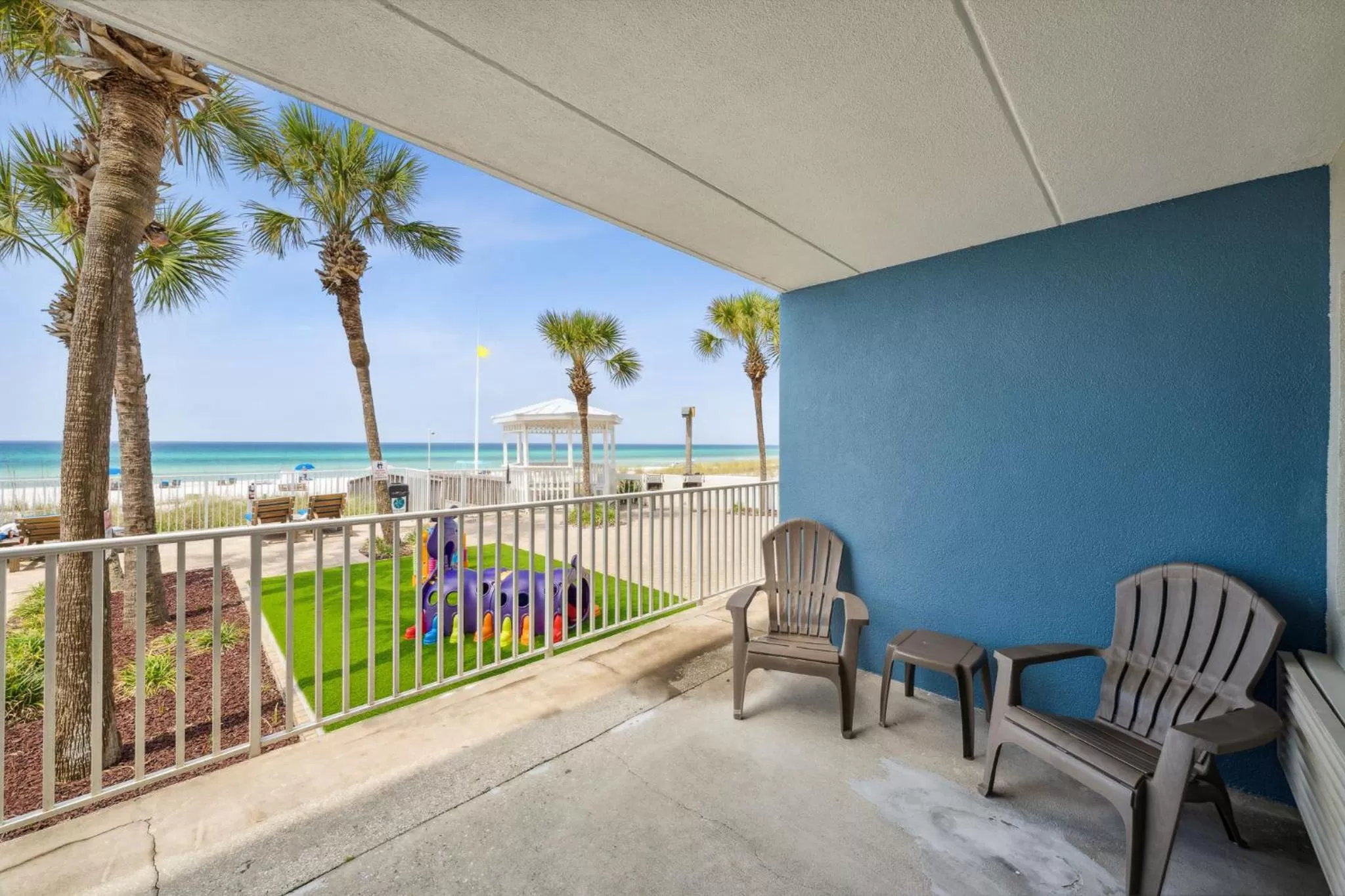 Patio in Sugar Sands Beachfront Hotel, a By The Sea Resort