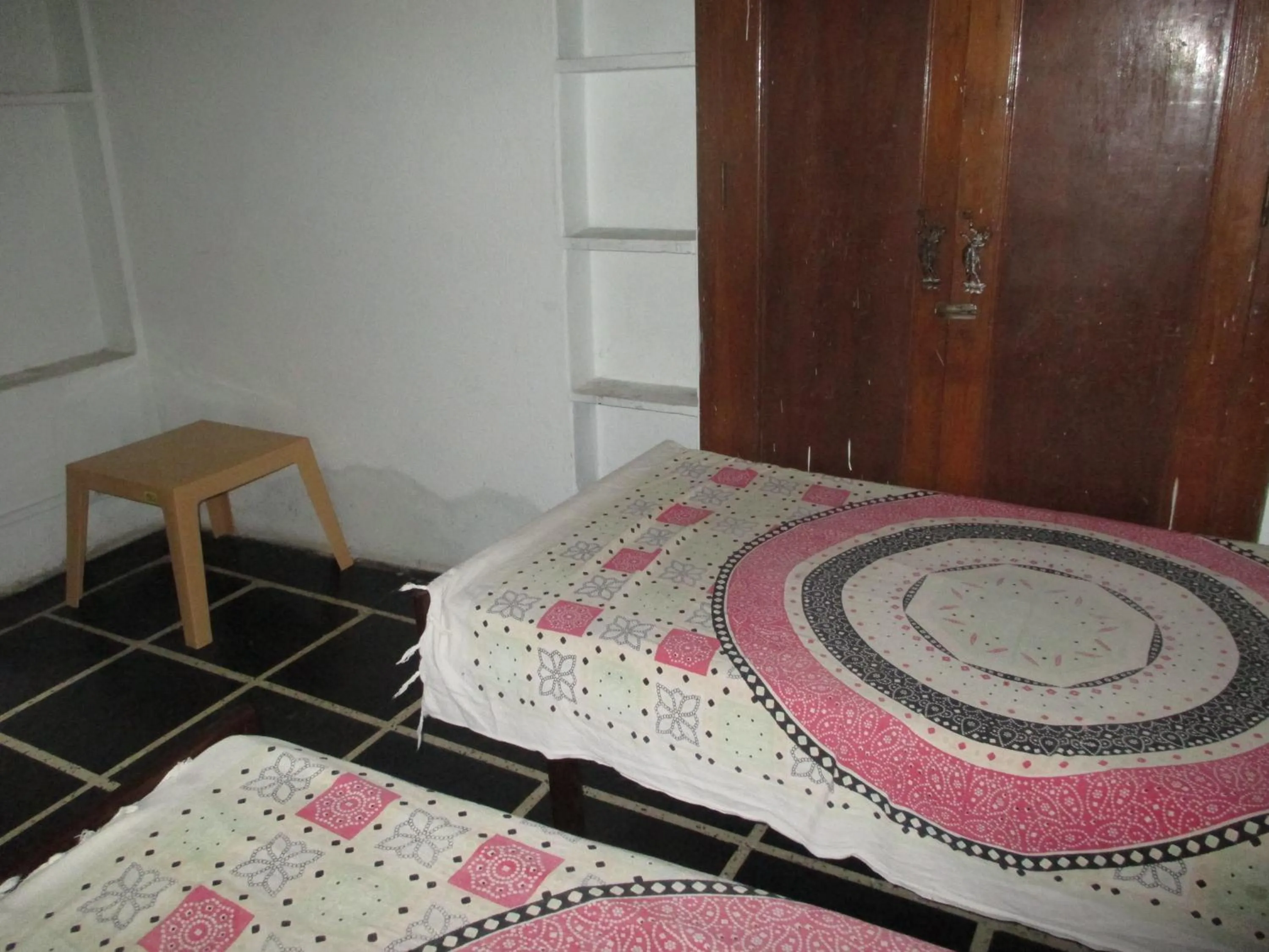 Bed in Udai Haveli Guest House